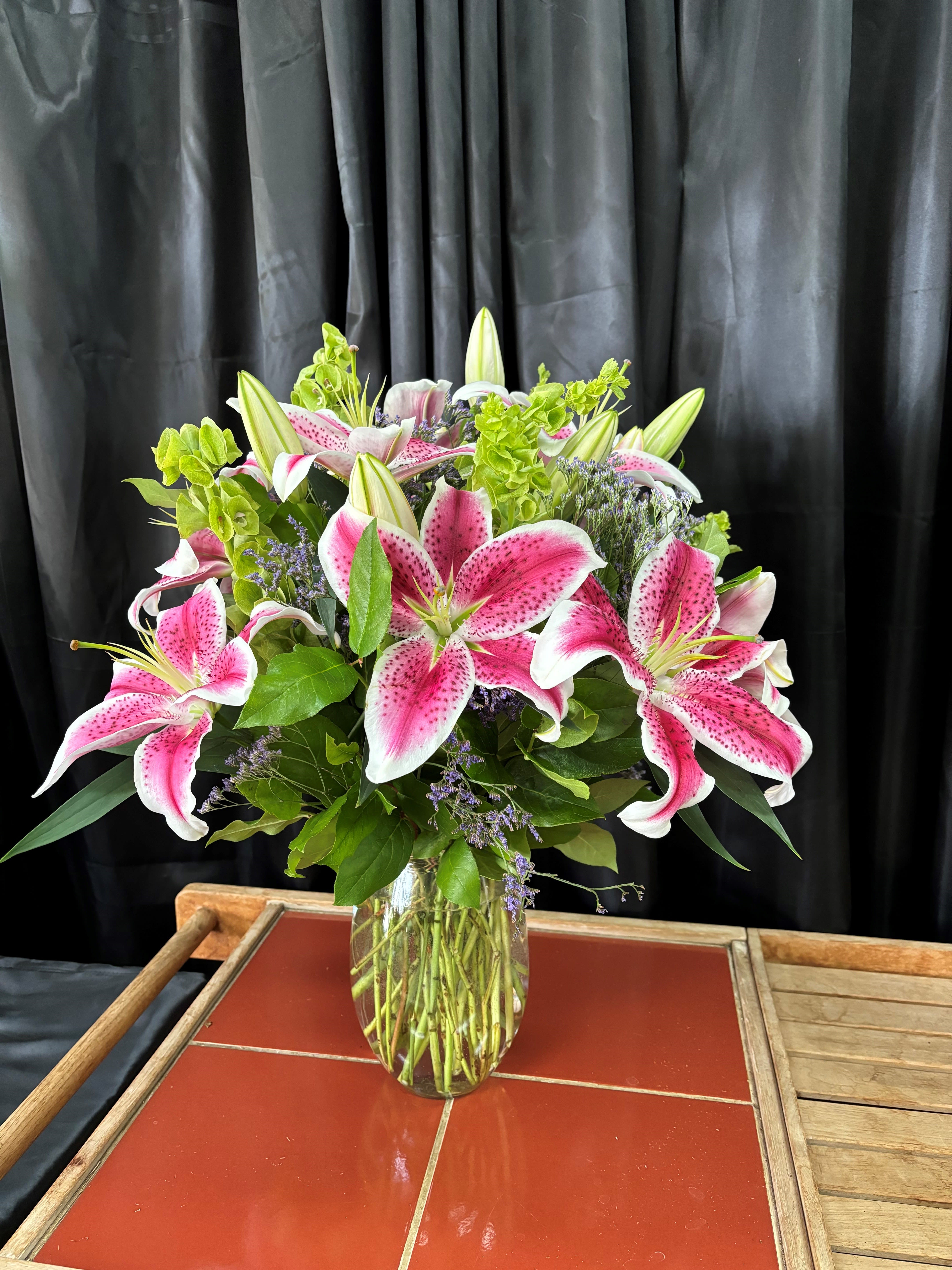 Stargazer Galore Stargazer Galore - A traditional arrangement of Stargazer lilies and quality greens and filler