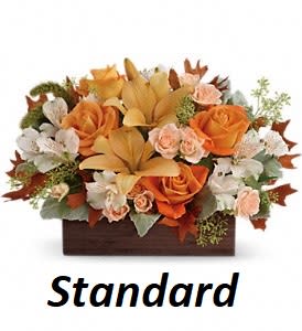 Fall Chic Bouquet Fall Chic Bouquet - Give any fall gathering a special chic feeling with this wonderful autumnal arrangement, featuring roses and lilies. Hand-crafted and delivered in a wooden rectangle. This impressive arrangement features roses, asiatic lilies and alstroemeria, accented with dusty miller, seeded eucalyptus and millet.