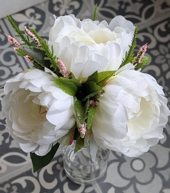 White Peony Silk Bouquet (Vase Not Included) White Peony Silk Bouquet (Vase Not Included) - This Bouquet Cannot be changed. This includes 3 white peony and pink filler with white ribbon.