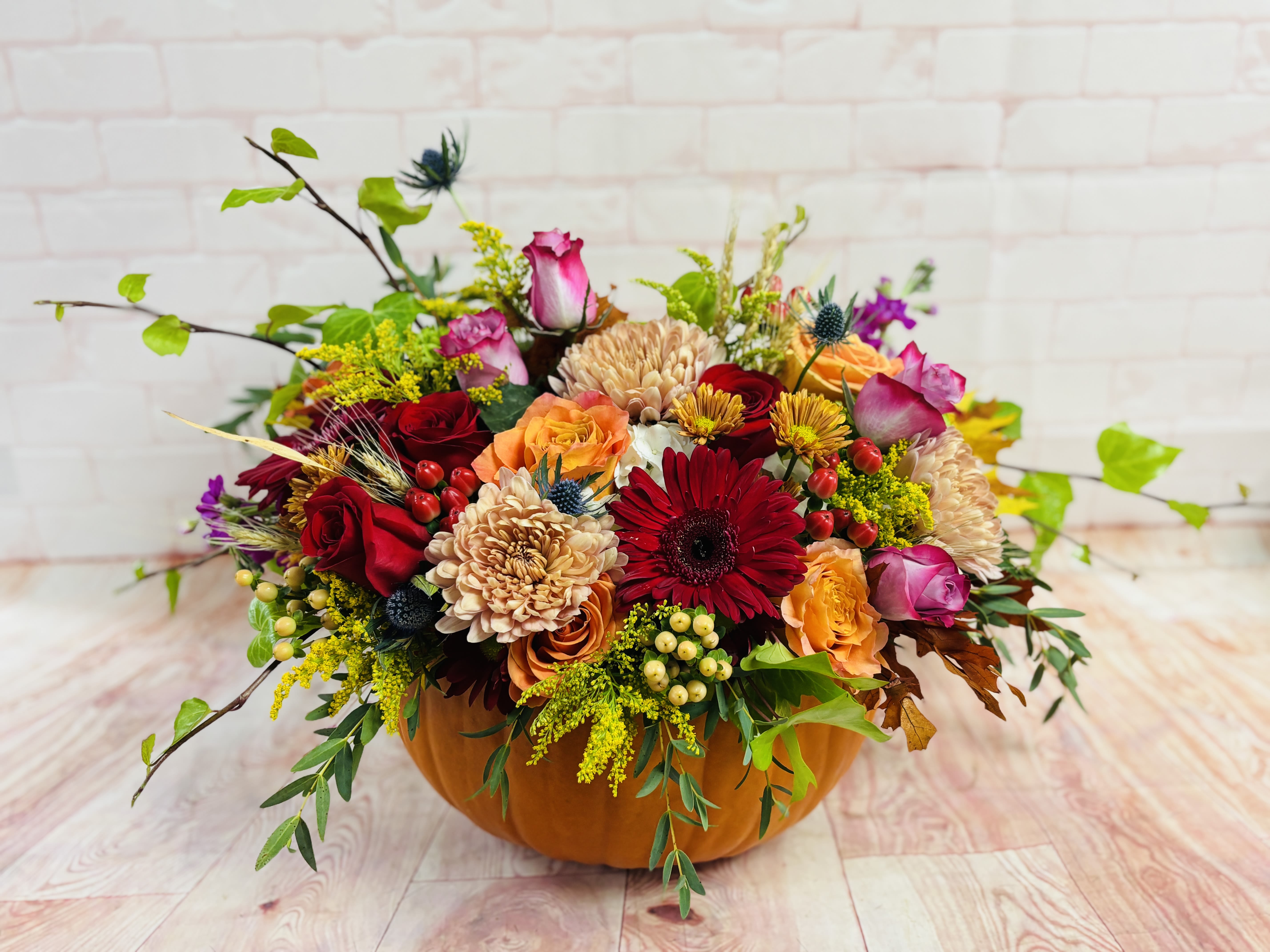 Pumpkin Spice  - Deep , lush , vibrant and warm fall tones , expertly arranged in a freshly carved oversized pumpkin !  Stunning centerpiece or gift for the Fall season ! 