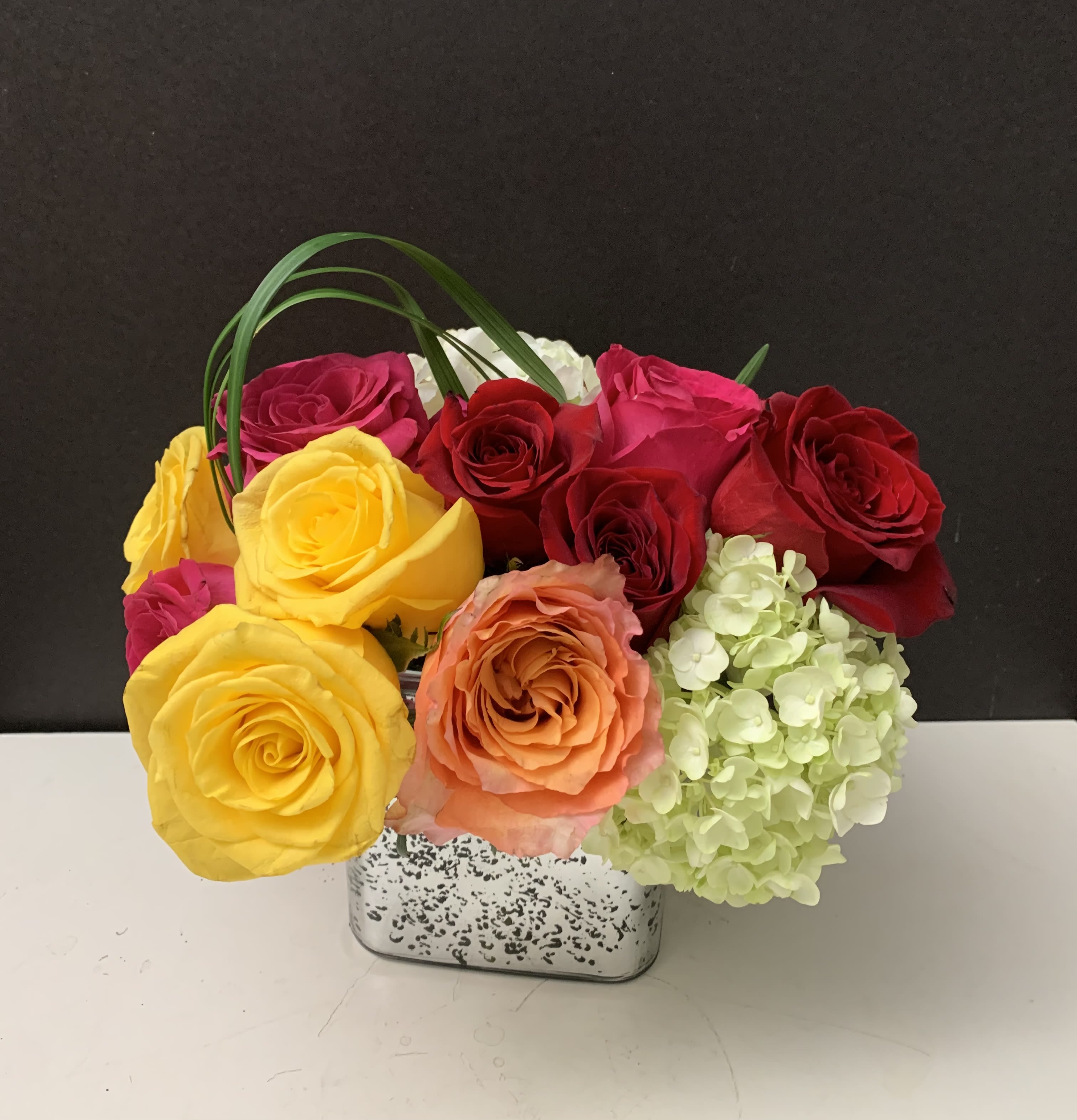 Colors in the Square  - Mixed color Roses, Hydrangeas, green in mercury square vase 
