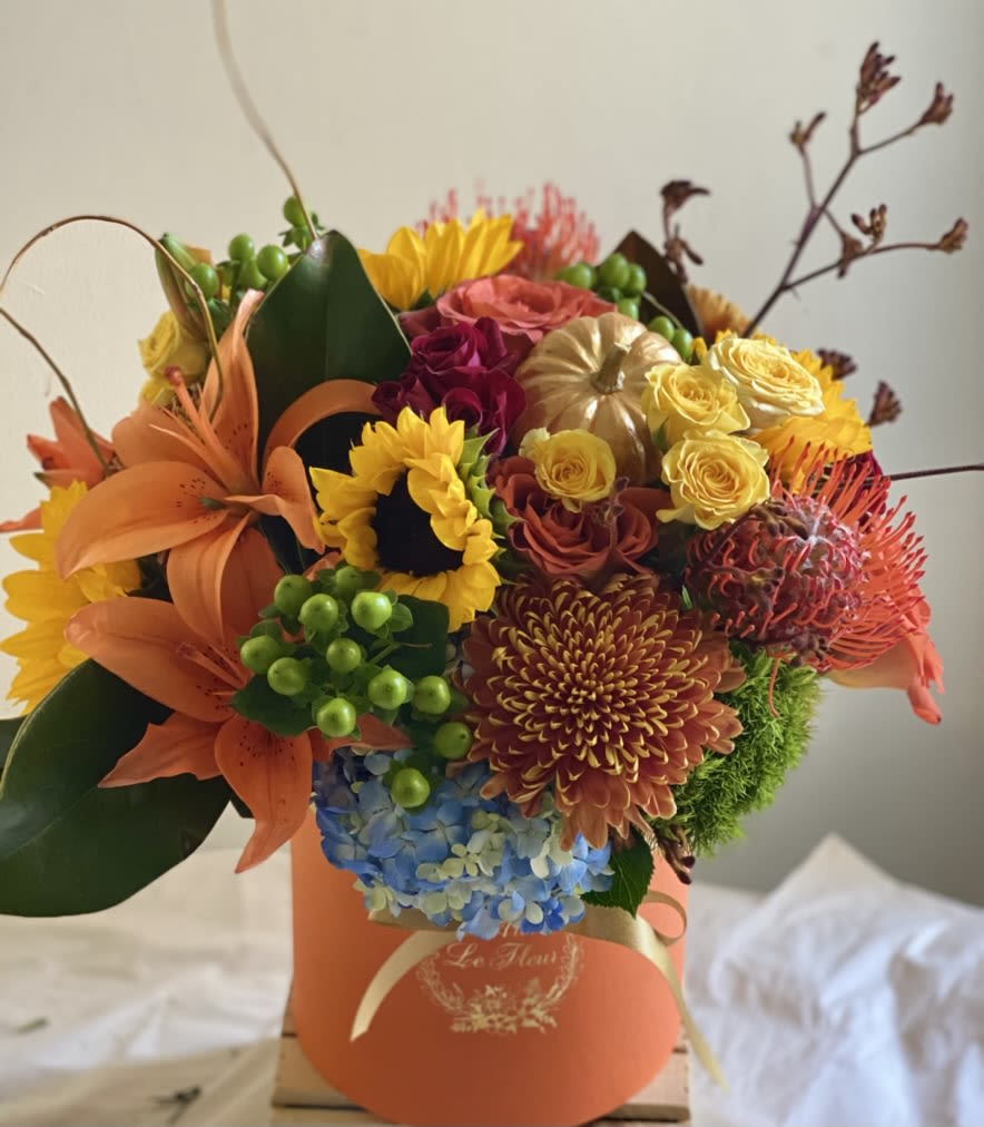 Harvest &amp; Blessings - Our best way to describe this hatbox is with the comparison of a thanksgiving meal were all the different elements come together as one in a perfect combination of seasonal colors, textures, scents and accents that represents togetherness and warmth of the season.   