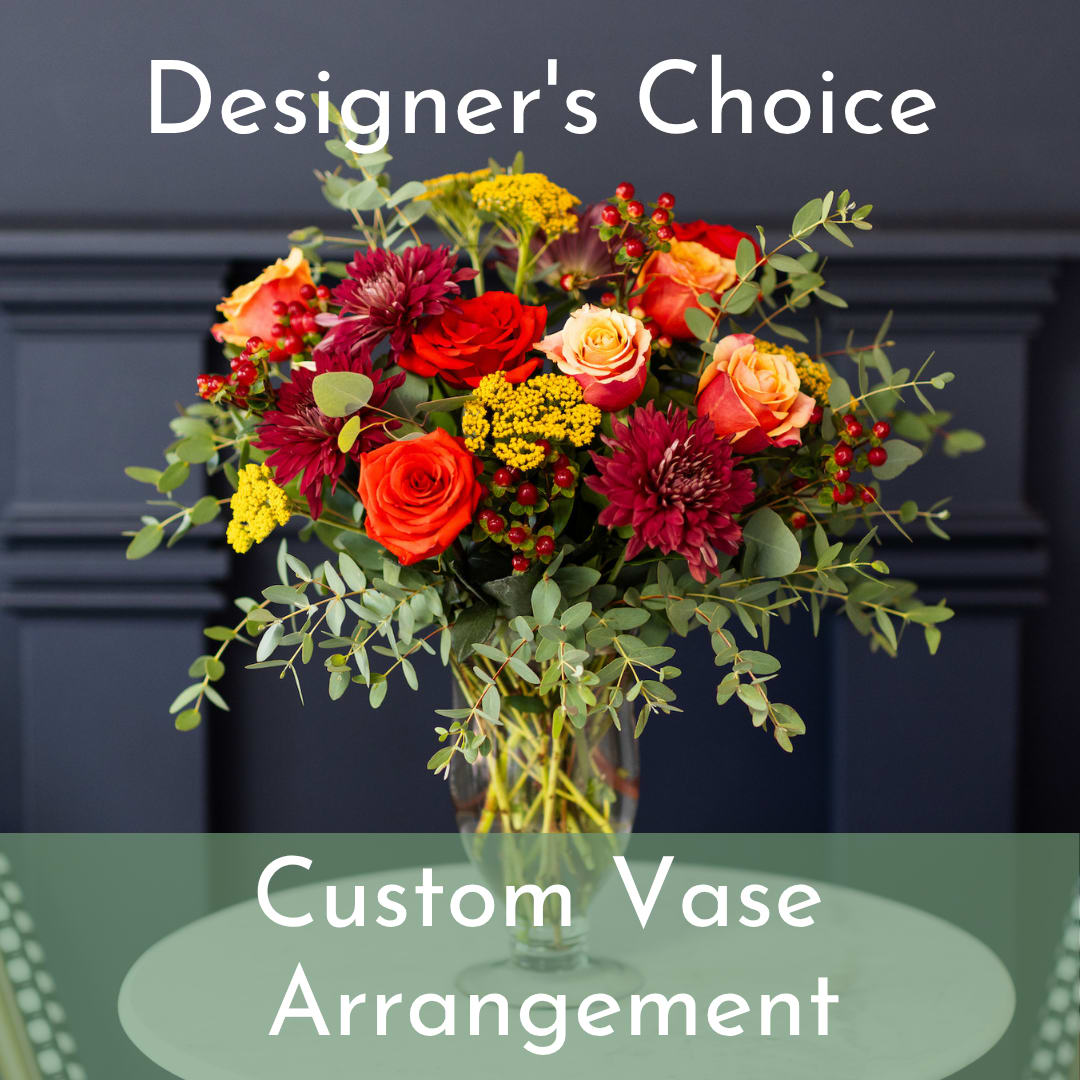 Designer's Choice Vase Arrangement - Our talented designers will create a custom arrangement using the season's freshest blooms and greenery. Choose the standard market size at $95, or upgrade to a larger size and we will add height and additional blooms. Please give us a call if you would like to discuss the arrangements size, color or an alternative budget amount: (703) 779-3530. 