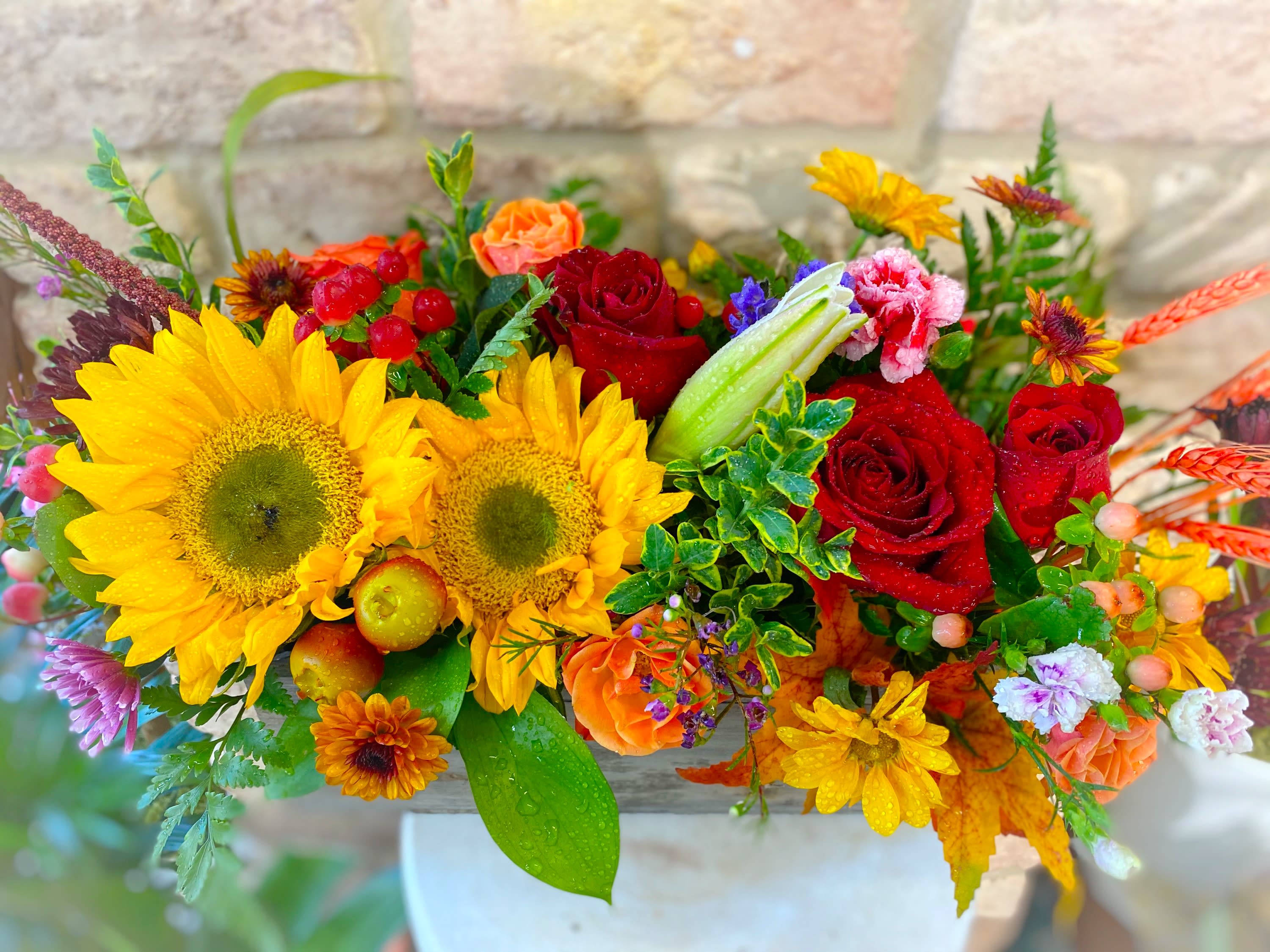 Painted Autumn Centerpiece Box Painted Autumn Centerpiece Box - Colorful and Abundant large seasonal arrangement designed in a long wooden box, perfect for centerpieces for holiday gatherings and gifts. Made with various flowers and fall decor! Measures appx - 18" by 11"