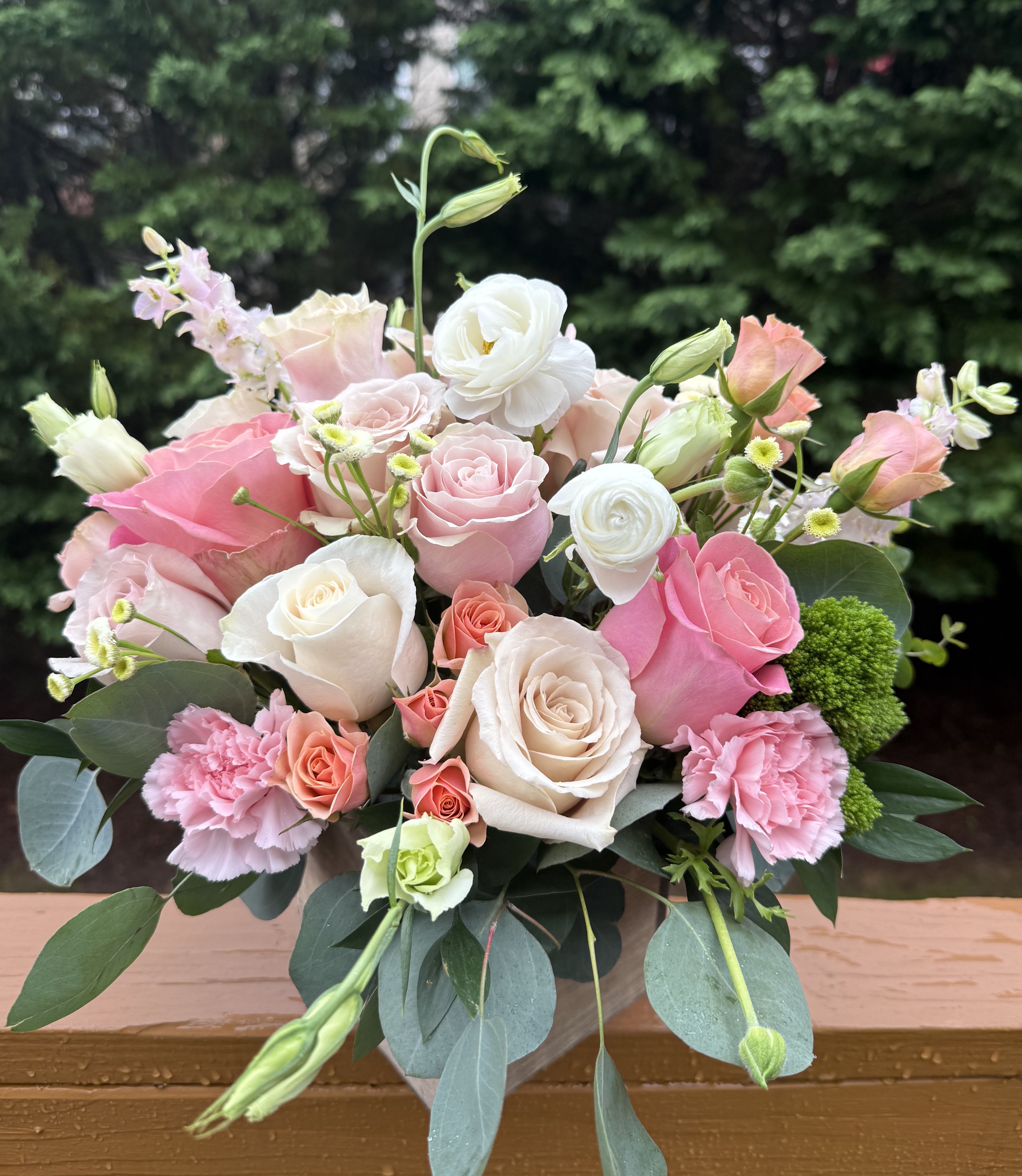 Bashful Box  - A beautiful and natural arrangement of soft and pale pinks and creams designed in wooden box. Perfect for her birthdays, I love you, congrats, weddings and more. 
