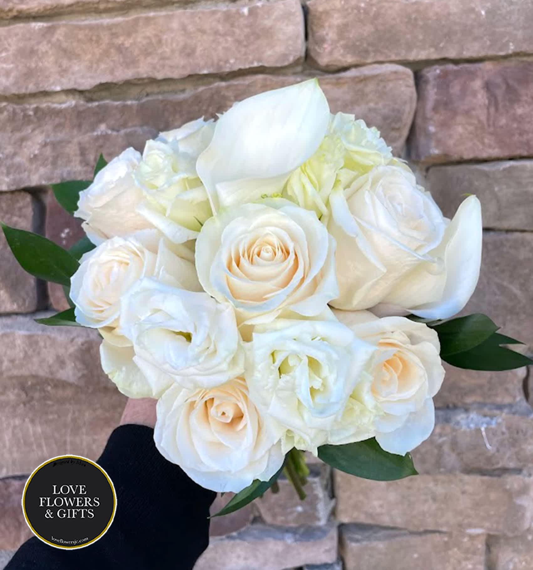 Elegant Ivory (Handheld Prom Bouquet) - Handheld bouquets have become very popular - this one is made with ivory roses, callas,  wrapped in satin ribbon. For Prom, Homecoming, Dad and Daughter Dance, Weddings and more.  - STANDARD is just the handheld bouquet - DELUXE is the handheld bouquet AND a matching boutonierre  If you would like us to switch out certain flower/ribbon color, please write at "Florists Instructions" at Checkout (Depending on availability, filler flowers and greenery may vary)