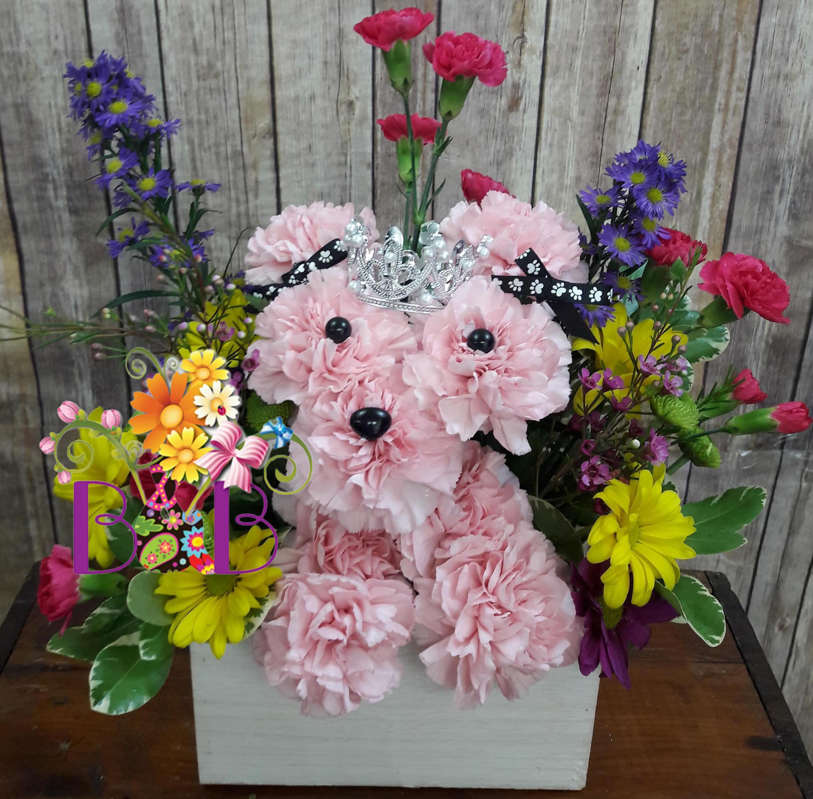 Puppy Love - Unleash smiles with our Puppy Love arrangement! This customer favorite creation makes a great gift for pet lovers or anyone who could use a little puppy love in their life.  Our florists hand-craft every arrangement, so colors and varieties may vary due to local availability. **Please specify an occasion so our designer properly adorns your custom puppy!    Occasions include:  Birthday, New Baby, Graduation, Get Well and More... Call for ideas!
