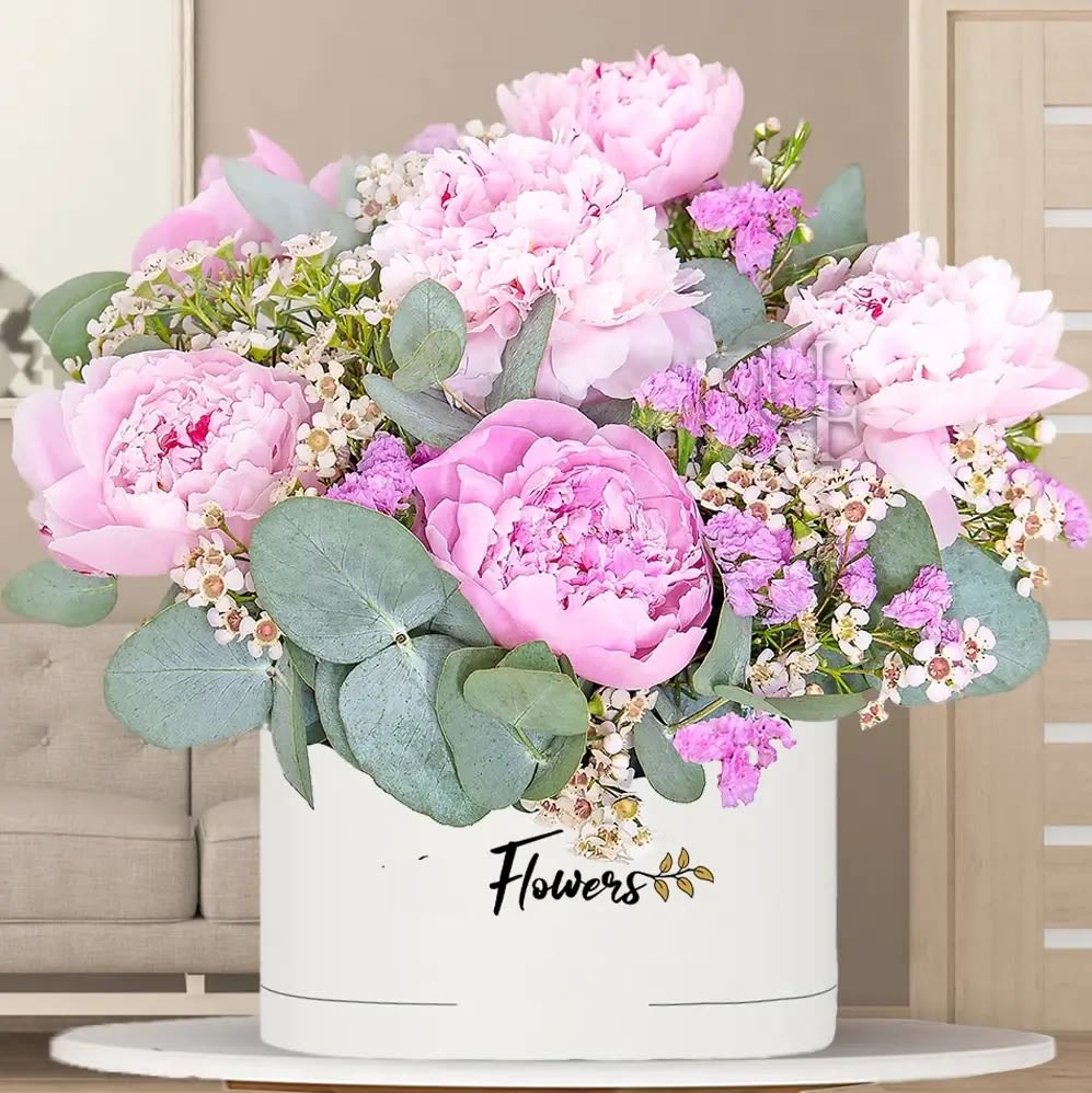 Precious Peony Bouquet Precious Peony Bouquet - Create lasting moments with the lush beauty of our pink peony bouquet. The rich fragrance and texture of these elegant, ever-popular blooms brings a nostalgia for gathering fresh-cut flowers right from the garden.7 stems of pink peonies with fillers in Box