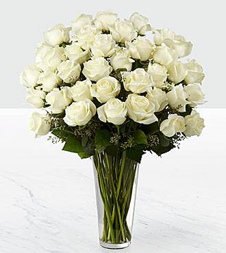 36 Roses White long stem arranged in a vase 36 Roses White long stem arranged in a vase - 36 White Roses arranged in a vase Deluxe upgrade provides more greenery and filler
