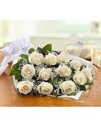 12 Roses White wrap Bouquet Long Stem with greenery as shown. (3 Options) - 12 White Roses Long Stem with greenery and filler flowers in a wrap bouquet.   