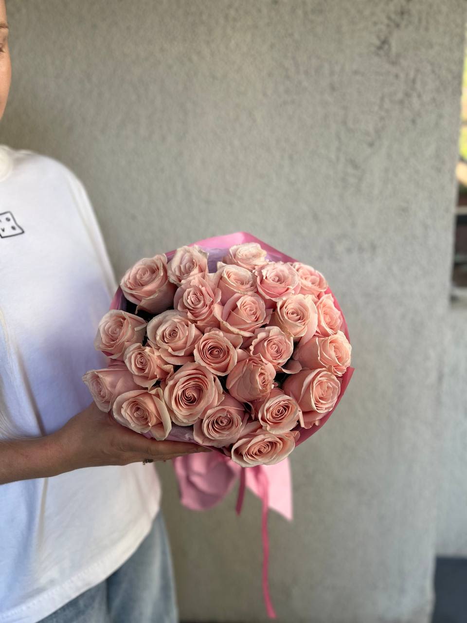 2 Dozen Pink Roses Bouquet 2 Dozen Pink Roses Bouquet - 2 Dozen Pink Roses Bouquet  Delicate, charming, and full of warmth — this bouquet of 24 pink roses comes beautifully wrapped, ready to delight and impress. The soft pink hue radiates tenderness and joy, making it perfect for birthdays, anniversaries, or simply to show someone how much you care.  The elegant wrapping enhances the natural beauty of the roses, creating a polished and luxurious presentation that makes every gift feel extra special.