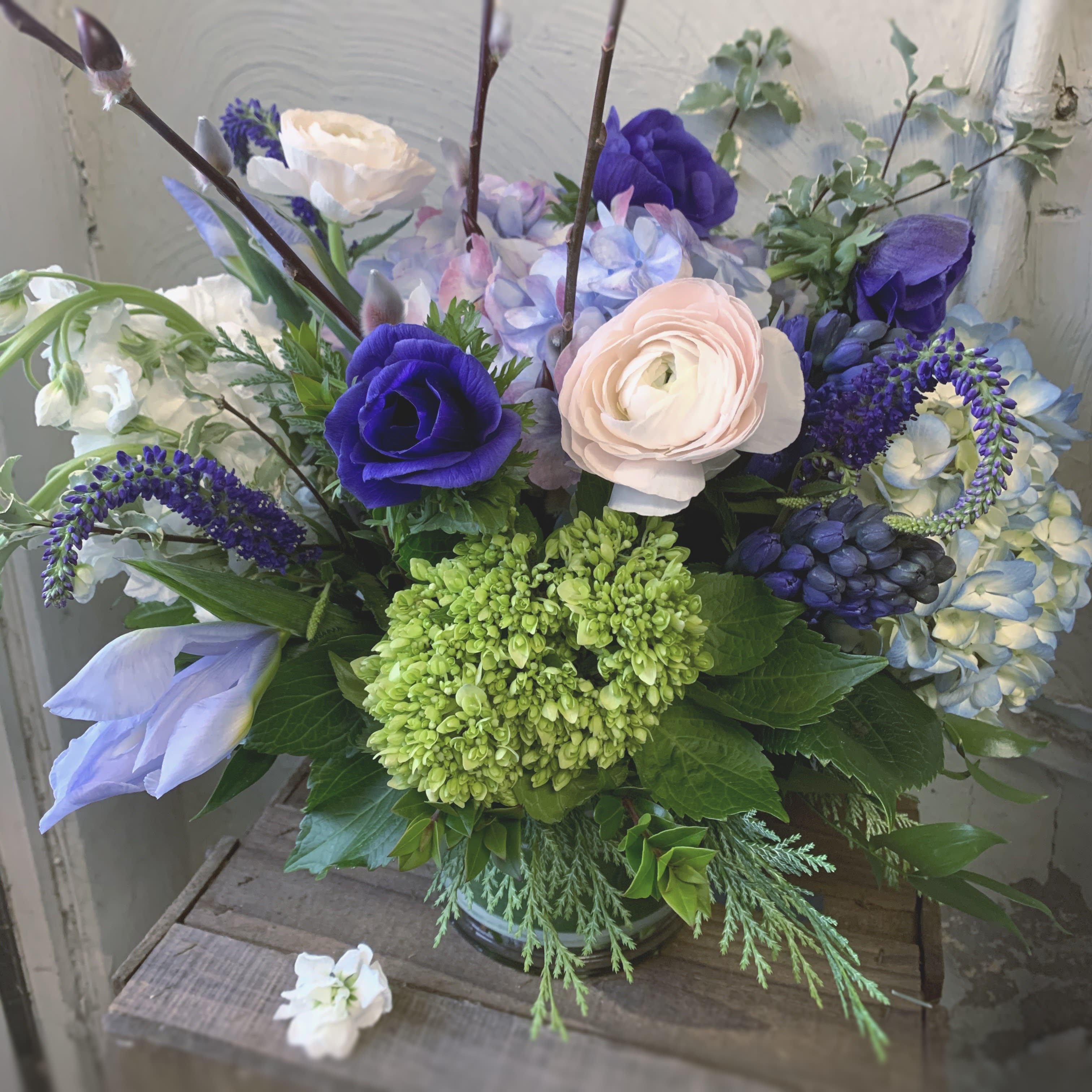 Moody Blues -  Hydrangea, anenomes, iris, veronica and stock in soft blush and blue hues.