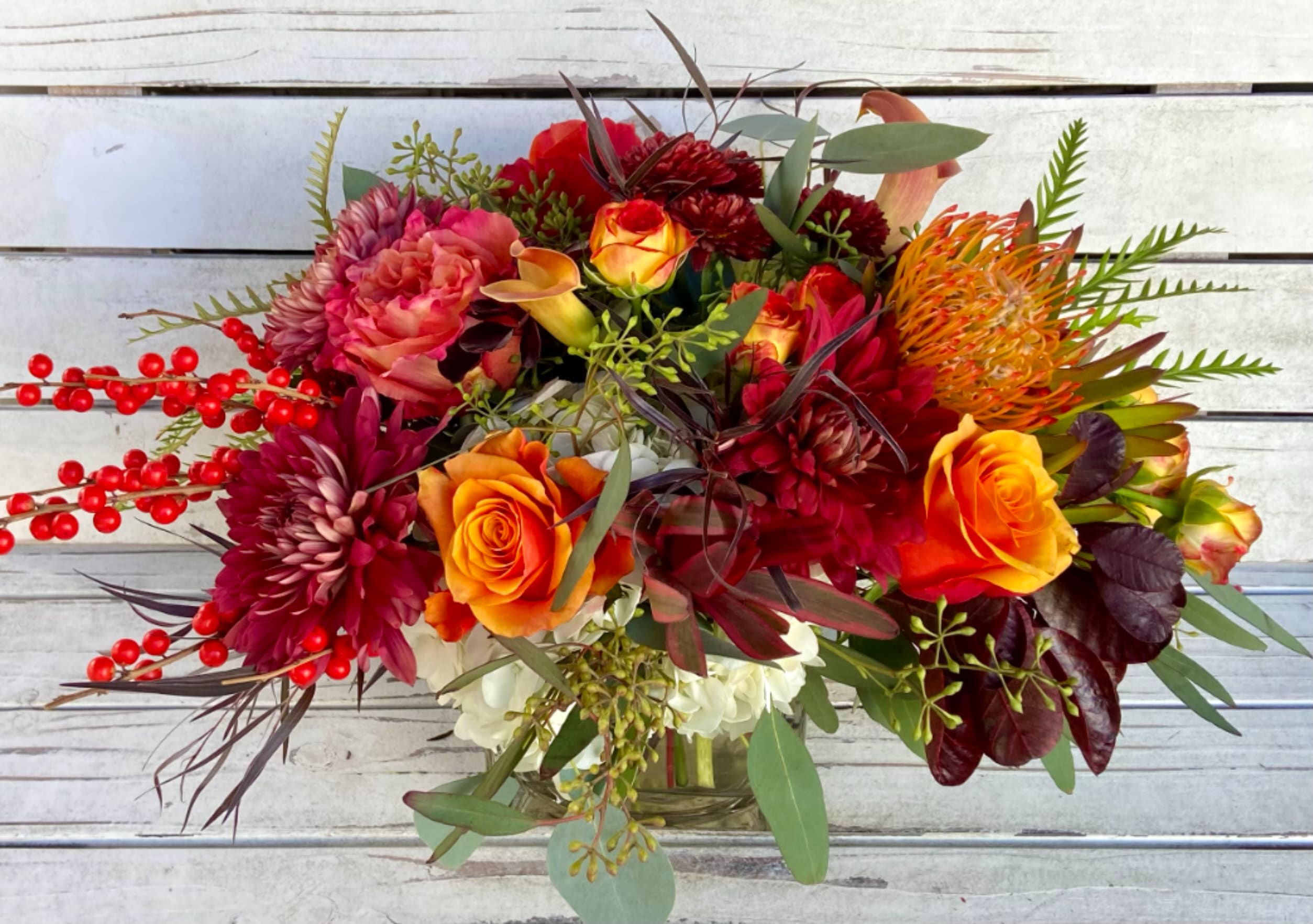 Large Thanksgiving Centerpiece - This festive thanksgiving centerpiece is perfect for a larger dining room table. Approximately 11 inches tall and deep,  17 inches lengthwise.