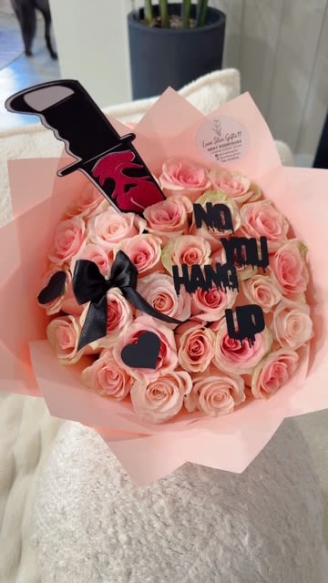 NO YOU HANG UP BOUQUET  NO YOU HANG UP BOUQUET  - A flirty twist on romance — this bold bouquet of premium pink roses is inspired by the playful “no, you hang up” moments we’ve all shared. Wrapped in soft blush tones and accented with chic black details, it’s the perfect mix of sweet and savage.  Designed and handcrafted in Midland, Texas, this exclusive Lone Star Gifts creation turns every delivery into a story. Ideal for anniversaries, love surprises, or anyone who deserves flowers with attitude.  2 DOZEN