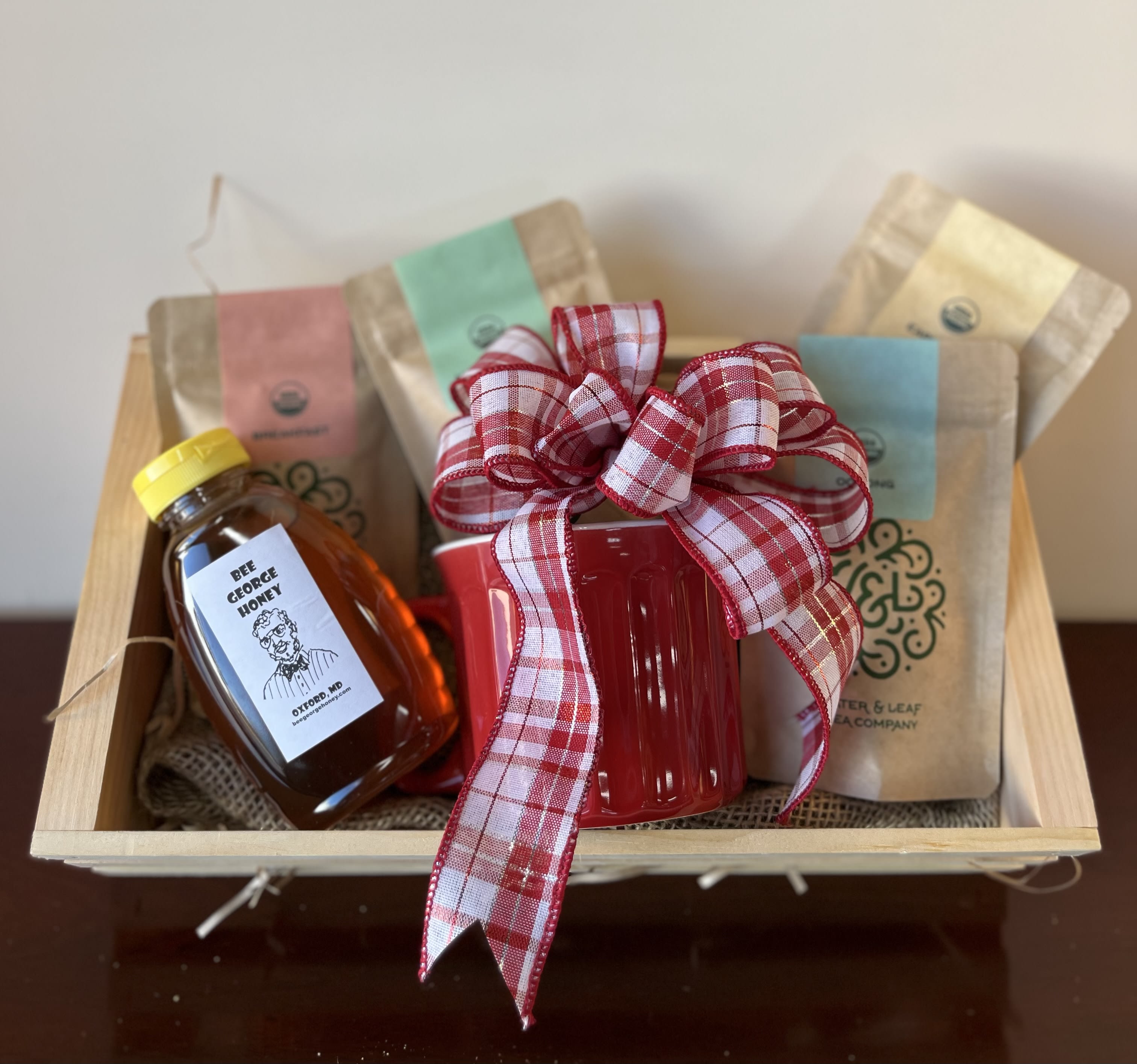 S& H Mercantile Tea Lover's Crate S& H Mercantile Tea Lover's Crate - A selection of our finest teas paired with locally sourced honey for the tea lover's in your life.  Available for local delivery or ship store to door anywhere in the country.  Call store for shipping details.