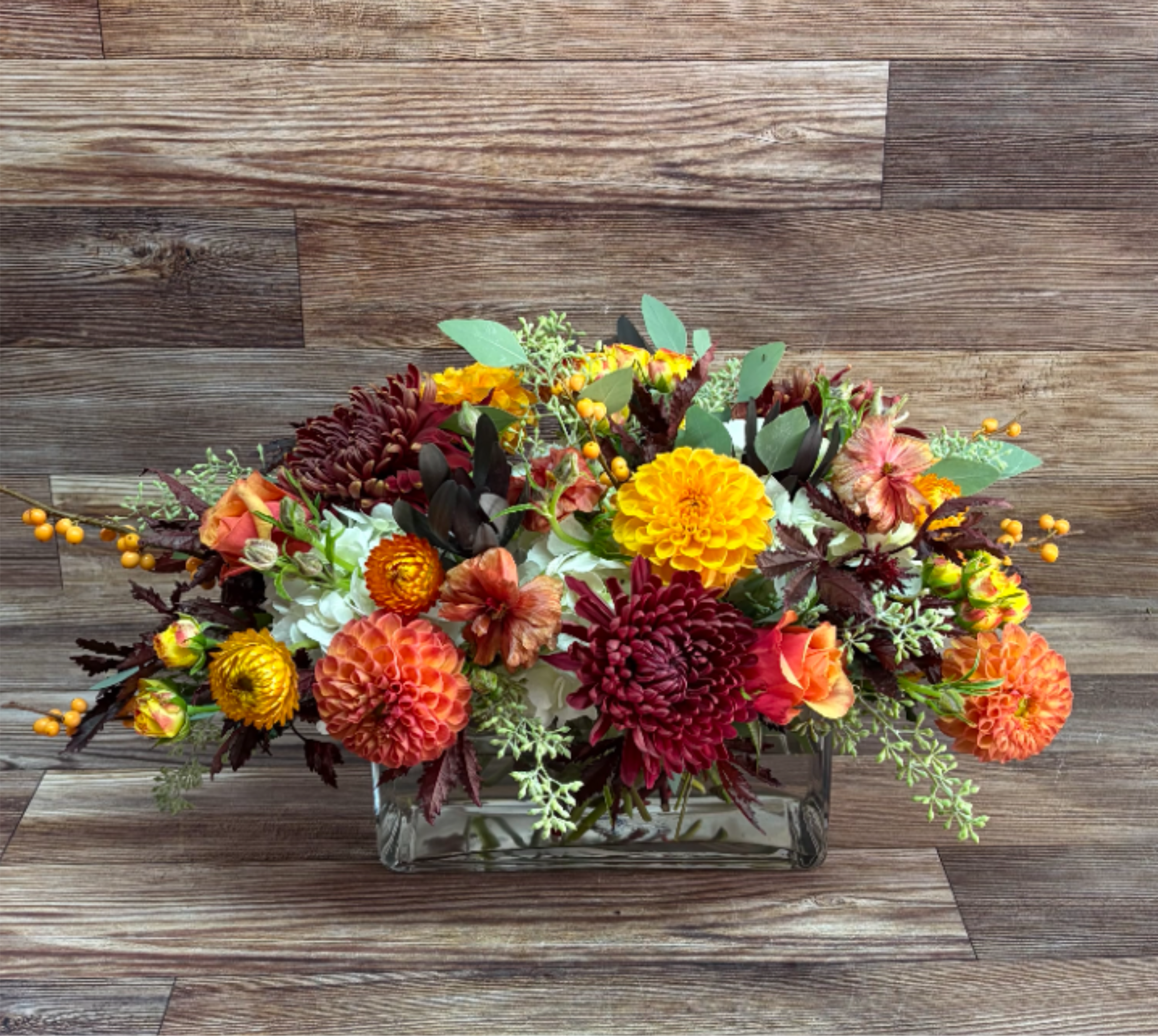 Extra Large Thanksiving Centerpiece  - Comes in long rectangular glass vase. This festive thanksgiving centerpiece is perfect for a larger dining room table. Approximately 11 inches tall and deep,  21 inches lengthwise.