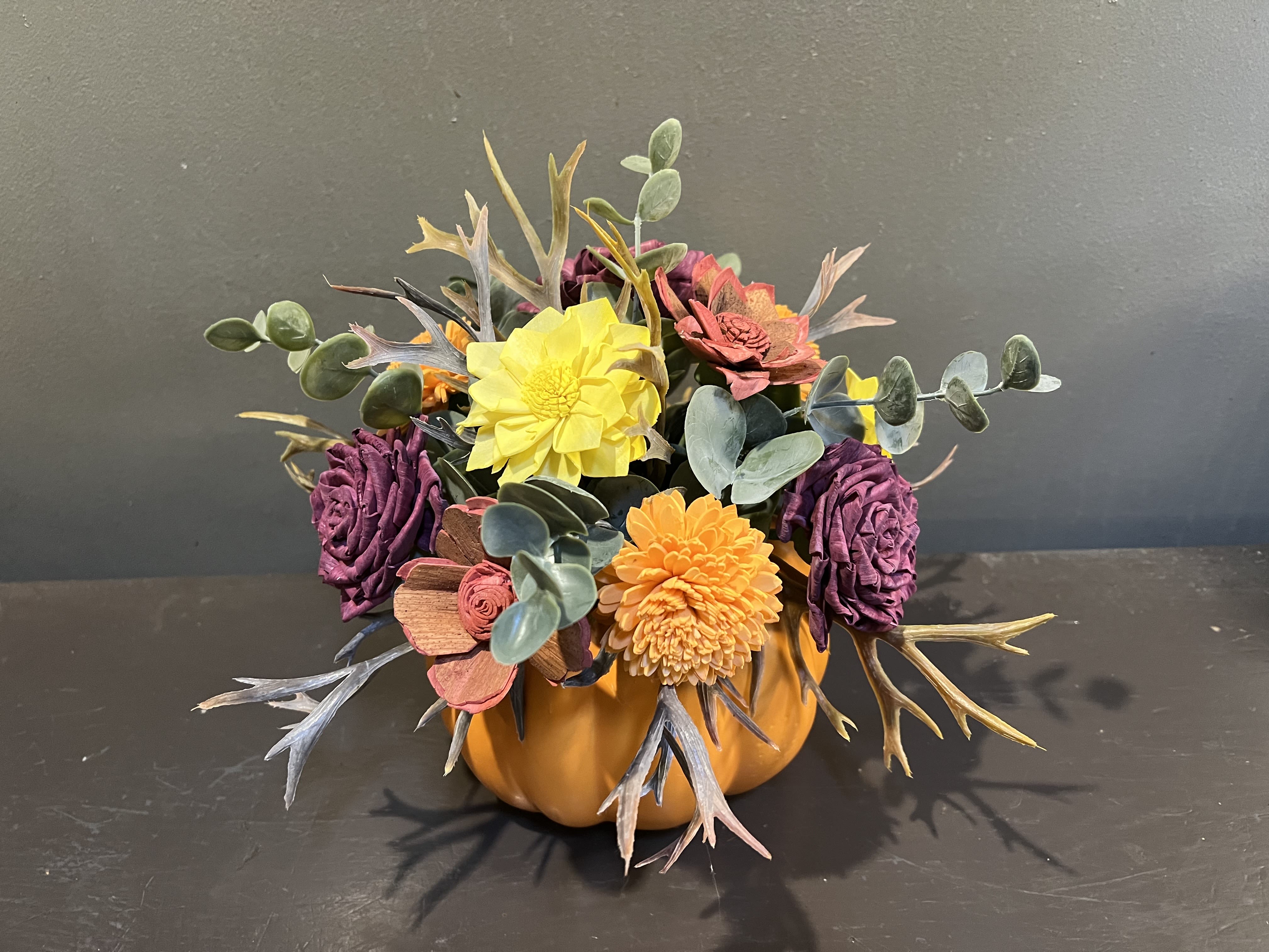 Sola Wooden Flower Centerpiece - Sunset Serenade Sola Wooden Flower Centerpiece - Sunset Serenade - Hand-dyed and hand-crafted in Minneapolis, these flowers made of balsa wood are a wonderful everlasting floral arrangement - great for those with allergies! Can be used as a natural essential oil diffuser too!   Measures approx. 11"Tx10"W and arriving in ceramic pot.