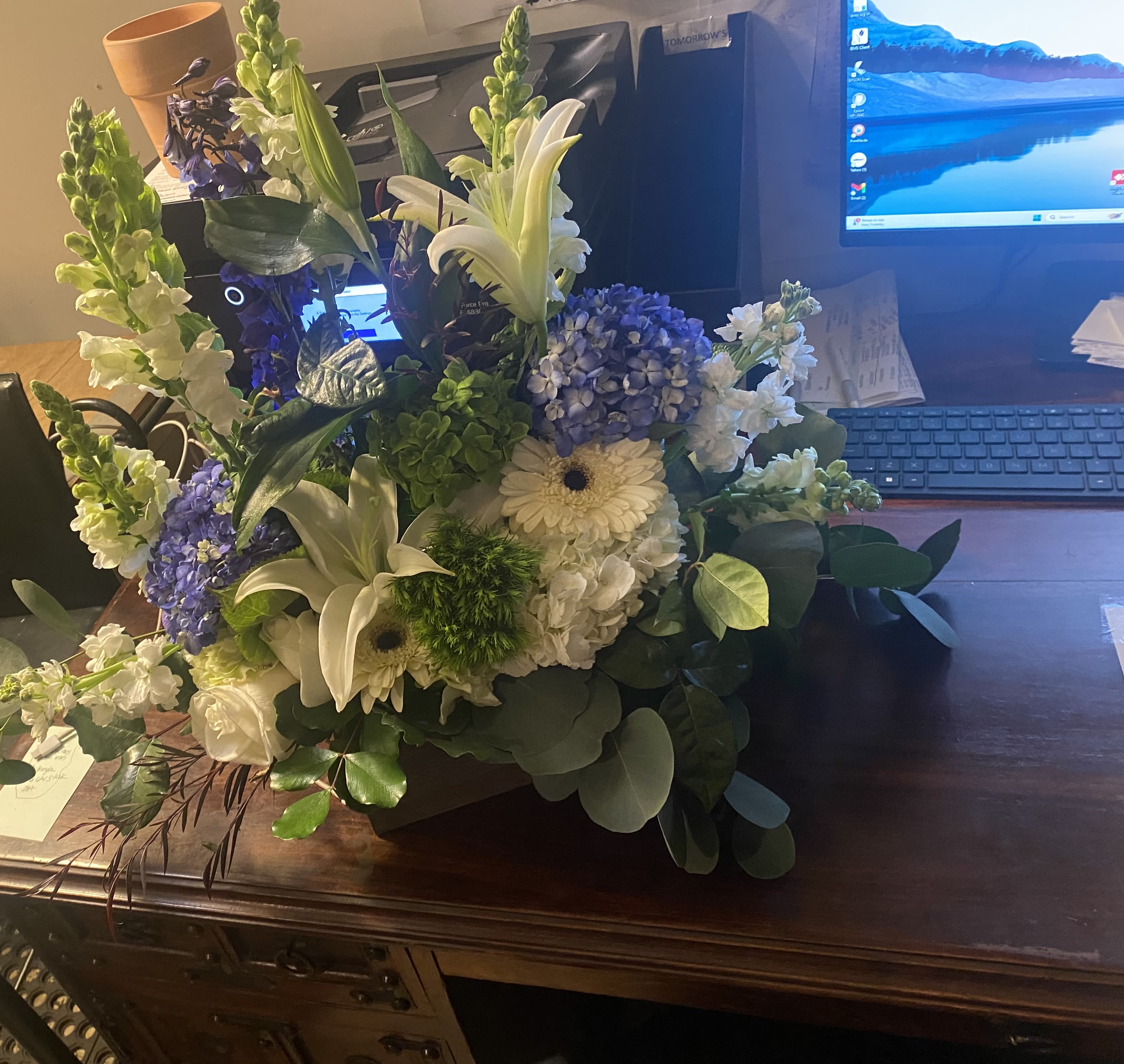 EVENT FLORAL - THIS BEAUTY IS PERFECT FOR YOUR NEXT EVENT. WITH LOVELY COLORS OF BLUE, WHITE AND GREENS FEATURING HYDRANGEA'S AND MORE. ONE-SIDED