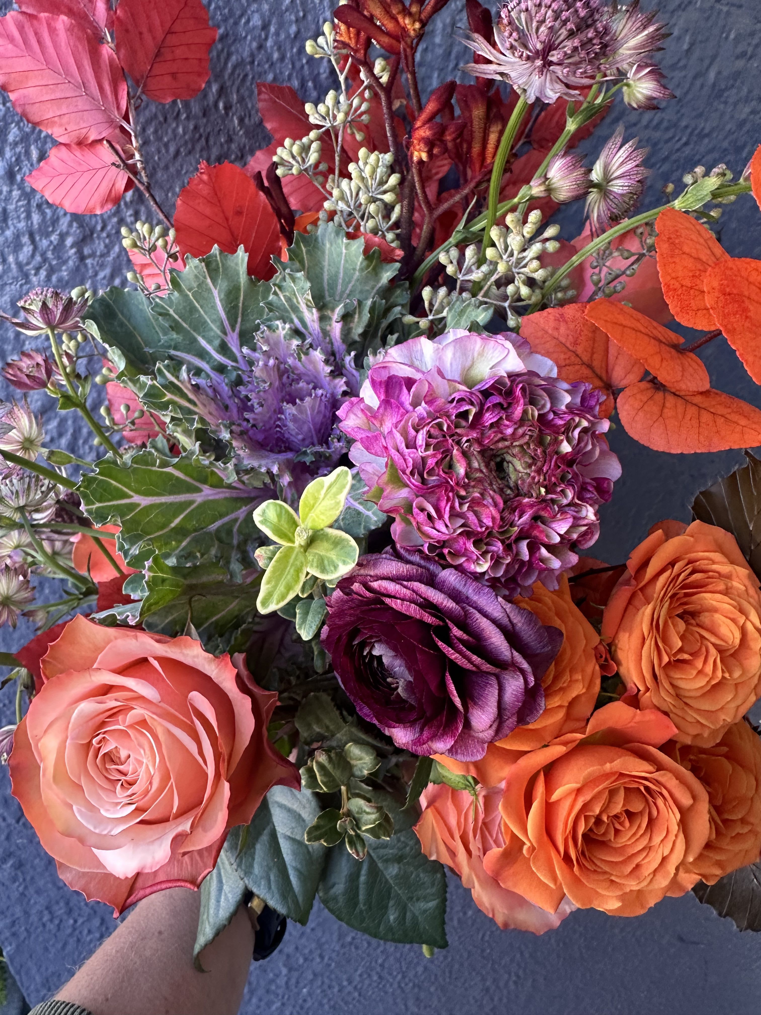 Seasonal Wrapped Bouquet - An excellent gesture for any flower lover!  In the Garden will use seasonal fresh blooms in a complimentary color scheme that any recipient will surely admire. Inquire about our Floral Subscriptions too!