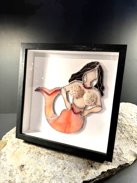 Framed Tumbled Glass Mermaid  - New to Firefly's collection are Framed Mermaids!  Their graceful lines and elegant charm are perfect for any decor.  They feature iridescent tails, glass bead accents, and sea shells!  They are framed in a wooden black shadow box style frame and measure 8&quot; H x 8&quot; W x 1.5&quot; D.