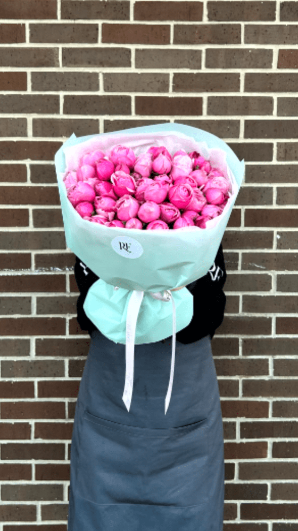 Blush Elegance - A striking single-variety bouquet of hot pink garden spray roses, radiating rich color and sophisticated charm. 