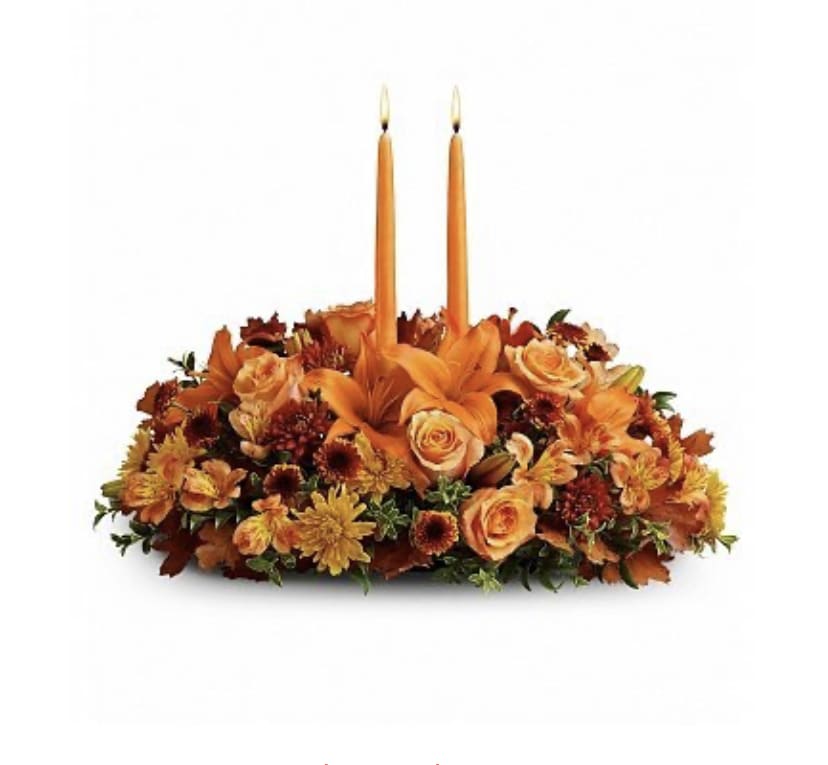 Celebration of Family - For a truly wonderful celebration, choose this big, bold and colorful flower arrangement of assorted blossoms, in complementary colors of yellow, white, orange, red and brown.   10&quot; Round
