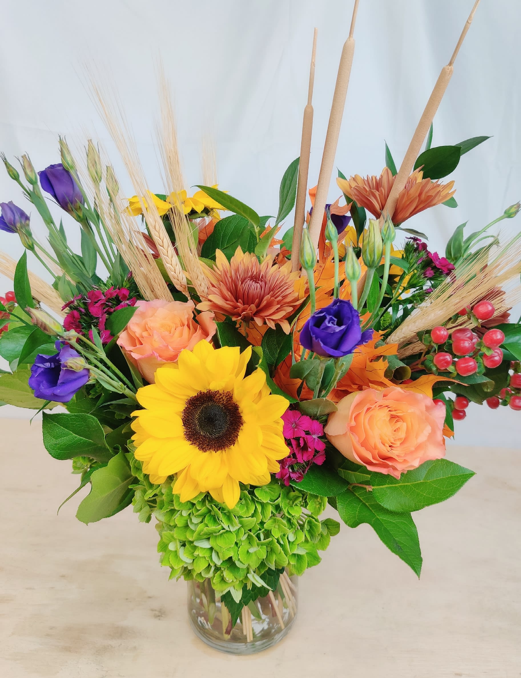 Autumn Splendor - Fresh fall tones flowers with lots of variety for every one!! This one is a great choice to brighten someone's day or bring in the fall kinda feeling. 