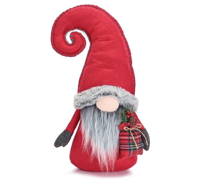 RED GNOME WITH CURLED RED HAT RED GNOME WITH CURLED RED HAT - Gnome wearing a red hat with black whip stitching all around the outer edge with gray fur trim on the brim. Gnome has a red body and a gray fur beard. He holds a red and black buffalo plaid gift bag with greenery in it.  16"H x 9"W x 5"D