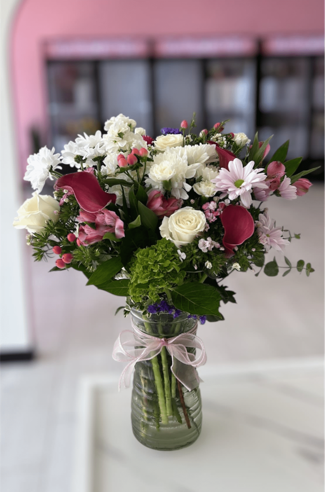 Pink Just Because &lt;3 - Please note that florists may need to make substitutions based on inventory to ensure the freshest blooms are delivered, while maintaining the arrangement's overall aesthetic.