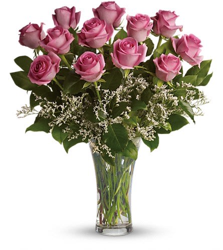 Make Me Blush - Dozen Long Stemmed Pink Roses - It's fun to be flirty! Send a dozen roses to the one you love and she just might make you blush. Especially if the dozen roses in question are this gorgeous! This arrangement is sweet and innocent as can be. Of course it's a bit sassy and a whole lot sexy as well. Sending a dozen perfectly pink roses and white limonium arranged in a glass vase to the woman you love shows that you know how much fun love is! And every woman appreciates that! Approximately 17 1/2&quot; W x 20 1/2&quot; H Orientation: All-Around As Shown : T4-1A Deluxe : T4-1B Premium : T4-1C