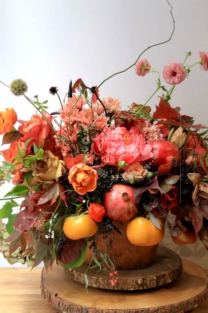 Bountiful Bountiful - Fruits and Blooms. So full and gorgeous. Perfect as a statement piece or as a centerpiece. Flowers may vary from photo. Send the best flowers from the best florist in NYC!