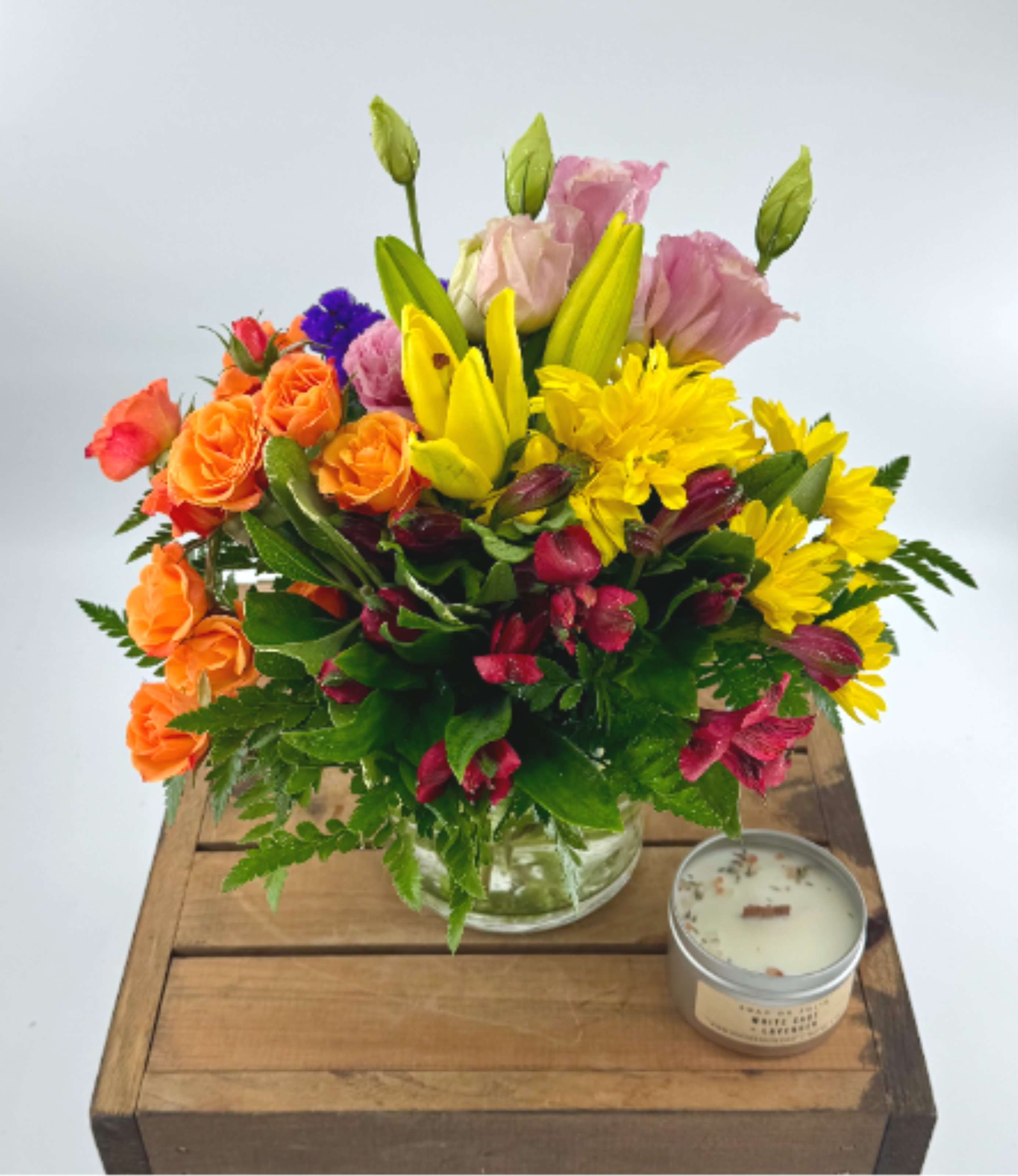 Juicy by BloomNation™ (DL) - Juicy by BloomNation™ packs a color punch! Featuring over 6 different flowers and greens, all in different colors, this arrangement is a great option for sending to co-workers, friends, or clients. Make a brightly colored splash.  