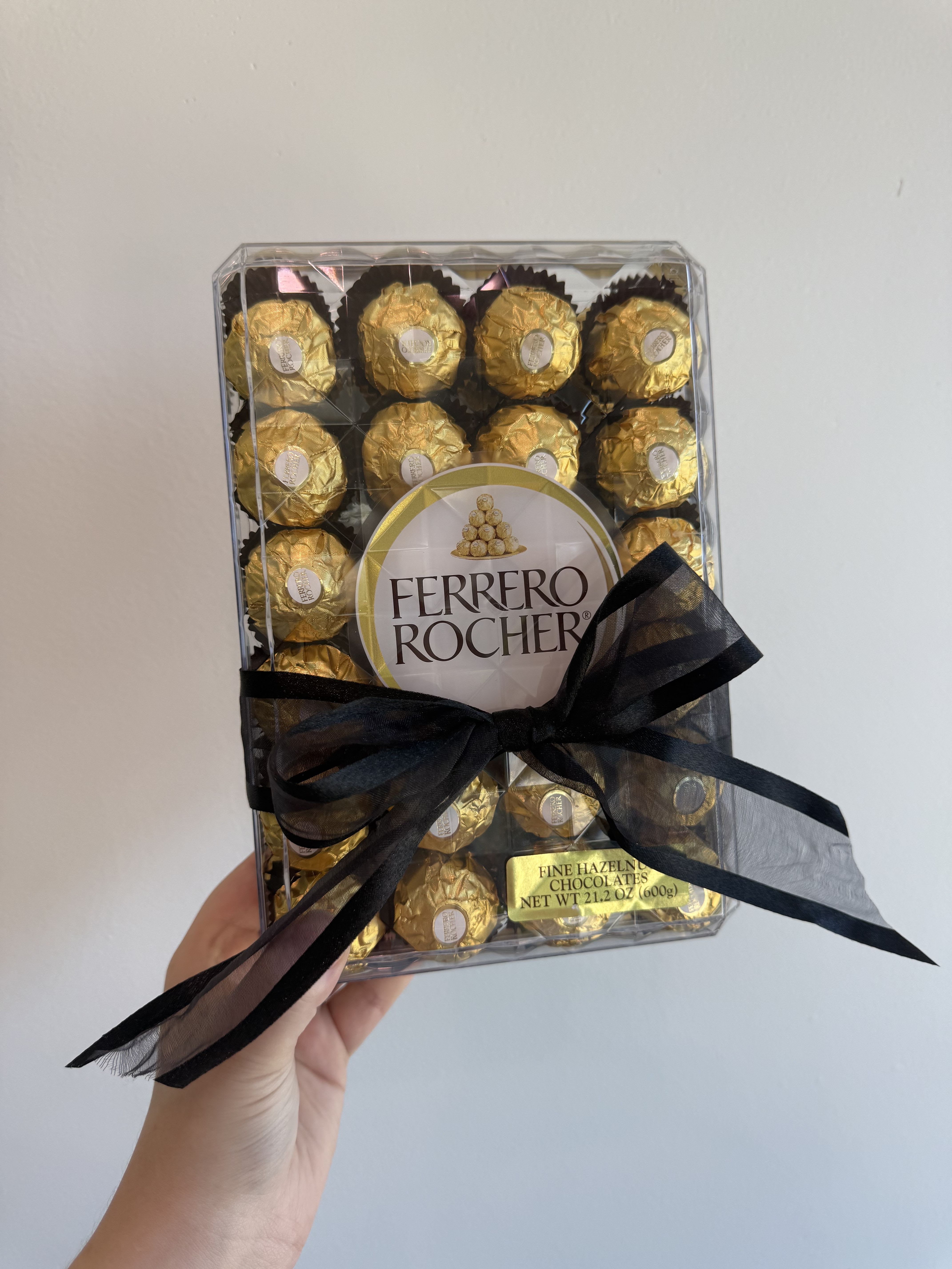 FERRERO ROCHER CHOCOLATE GIFT BOX - Ferrero Rocher's milk chocolate gift box offers a unique taste experience of contrasting layers: a whole crunchy hazelnut in the heart and a delicious, creamy hazelnut filling surrounded with milk chocolate, crispy wafers and gently roasted hazelnut pieces
