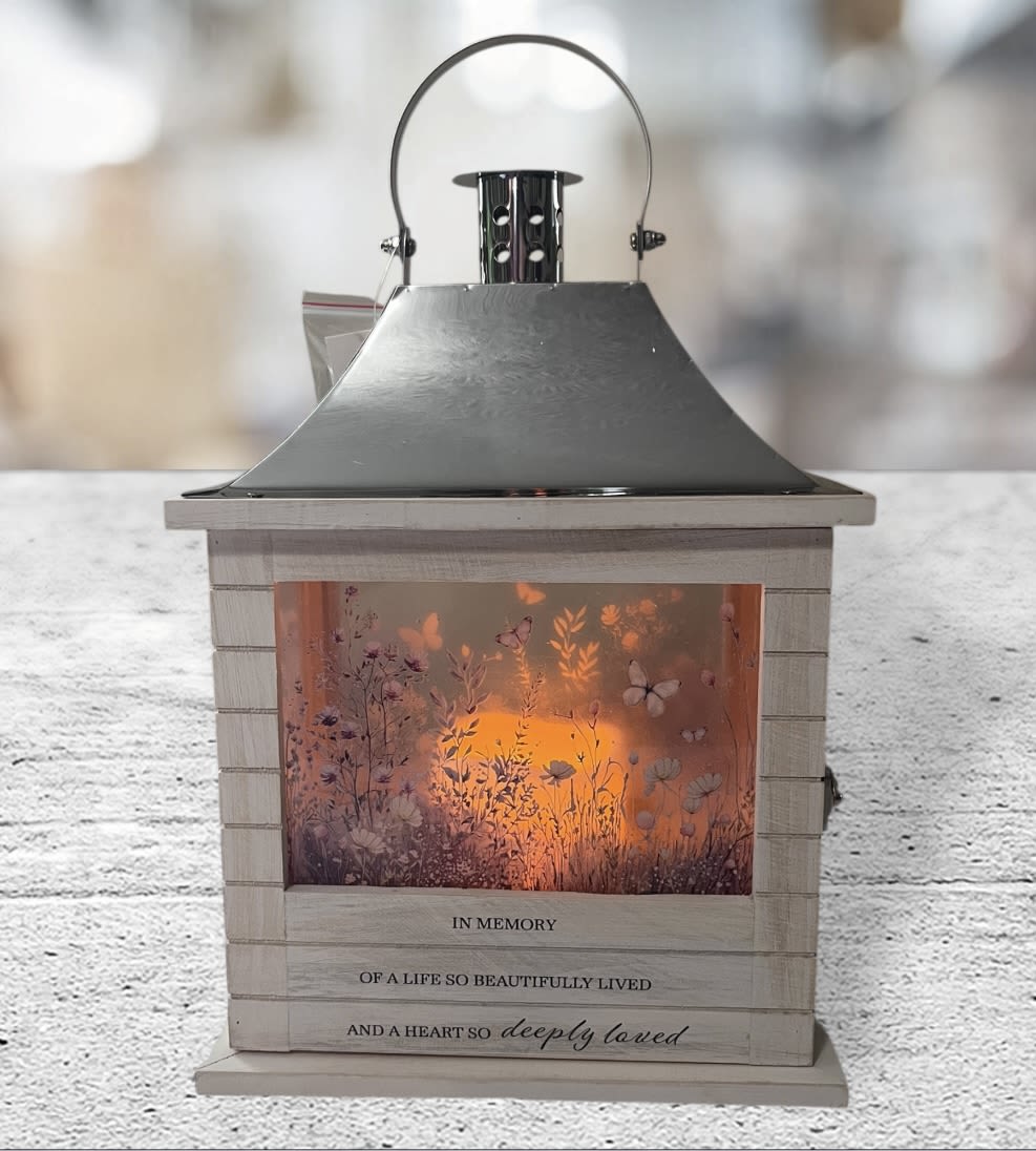 White In Memory Lantern  - This Lantern says In Memory of a life so beautifully lived and a heart so deeply loved. Batteries are not included. 