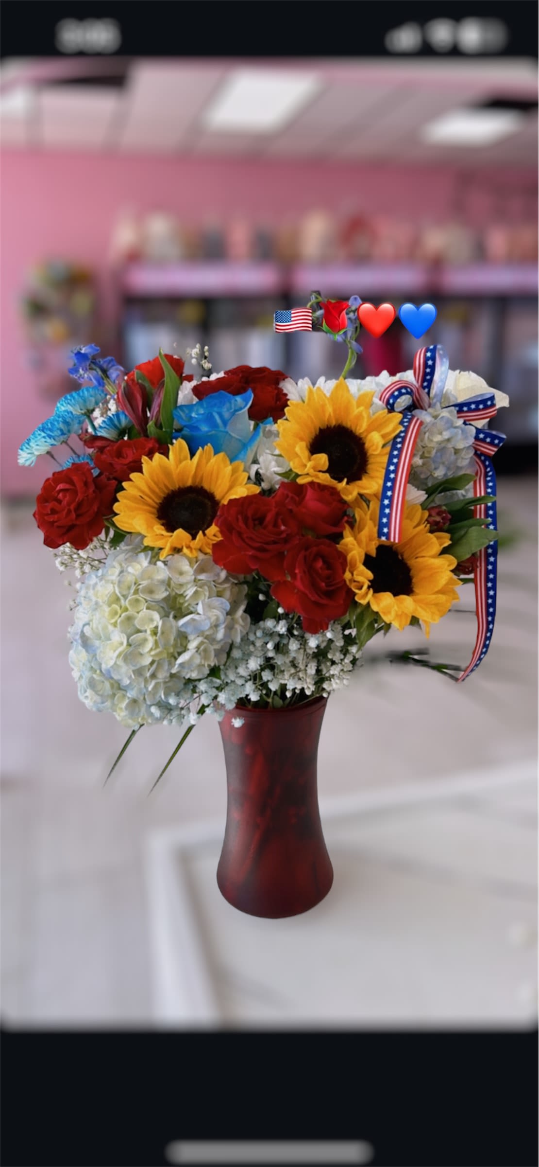 Premium Patriotic  - Please note that florists may need to make substitutions based on inventory to ensure the freshest blooms are delivered, while maintaining the arrangement's overall aesthetic.