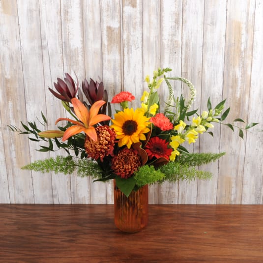 Fall Horizon - A bright and refreshing fall arrangement in a keepsake vase. 