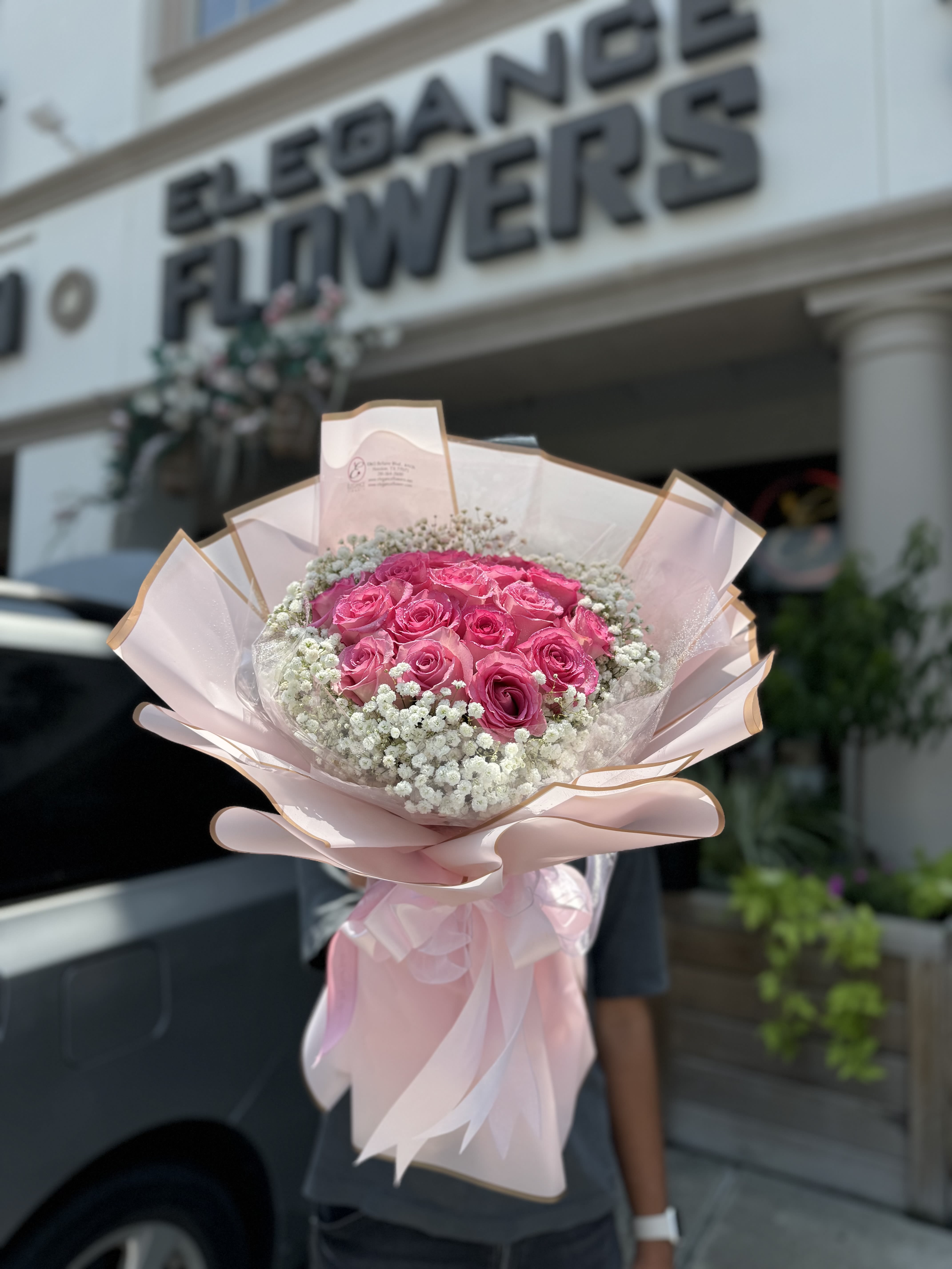 Wrapped Bouquet #15 - A wrapped bouquet of flowers is a beautifully arranged collection of blooms, carefully selected and elegantly wrapped in decorative paper or fabric. These bouquets often feature a mix of fresh, vibrant flowers, and complemented by lush greenery. Wrapped bouquets are perfect for any occasion, from expressing love and gratitude to celebrating special moments, offering a thoughtful and visually stunning gift.