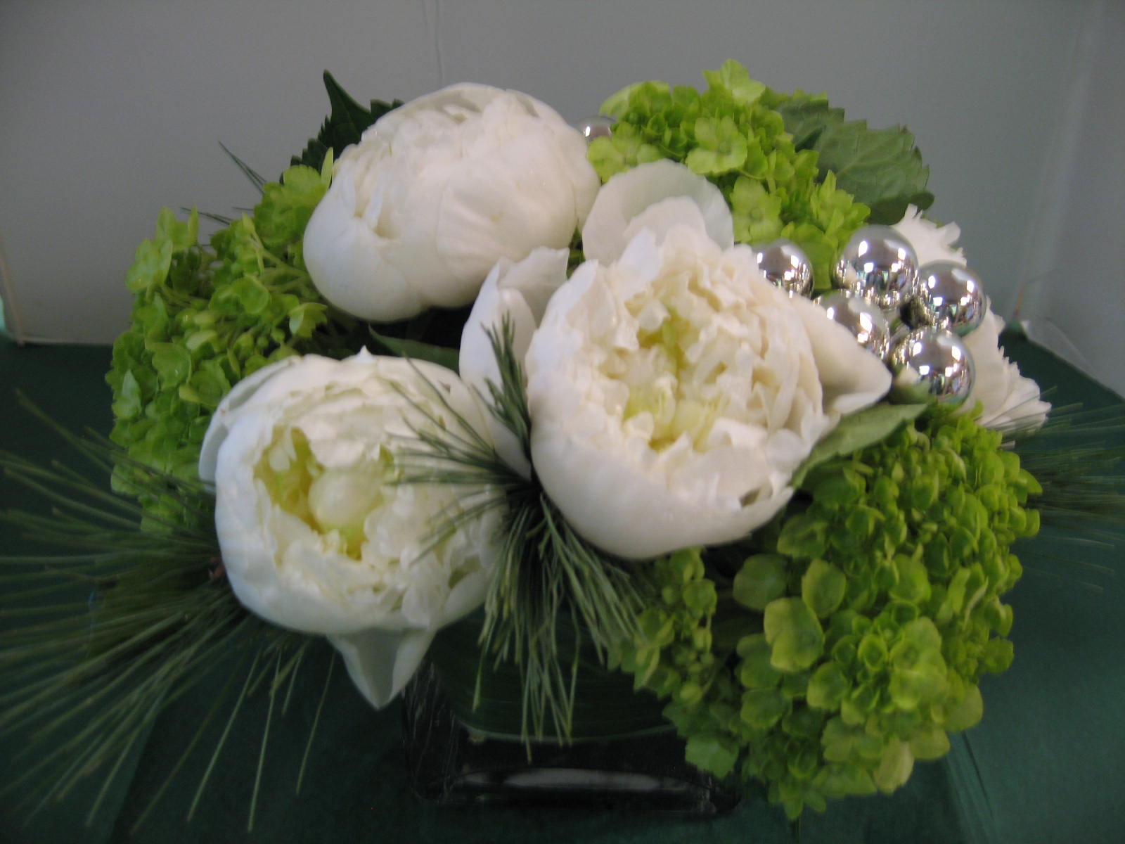 Peonies & Hydrangea Peonies & Hydrangea - Peonies(Seasonal), Hydrangea and Fancy Greens. Peonies & Hydrangea might be different color than picture. Depending on availability. Call for Colors of Peonies. (908-234-2900).