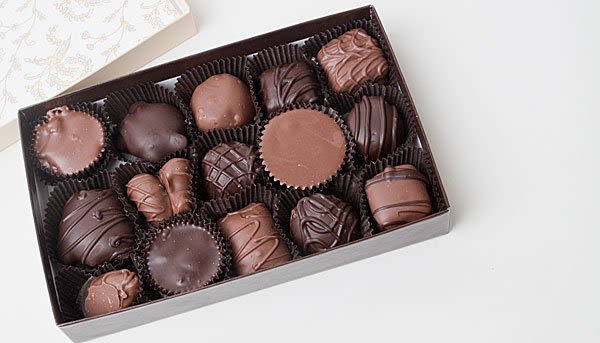 Assorted Box of Wockenfuss Chocolates - Crafted by one of Baltimore’s oldest and most beloved candy makers, Wockenfuss Candies has been a part of the community since 1915, delighting generations with their handcrafted chocolates. Each box features an irresistible variety of bite-sized milk and dark chocolate treats—perfect for gifting, sharing, or enjoying alongside a beautiful bouquet. Whether you’re sending flowers and chocolates for a birthday, anniversary, or just because, we make it easy with same-day flower delivery in Baltimore. Pair these local confections with our signature floral arrangements to add a taste of Baltimore charm to any occasion.