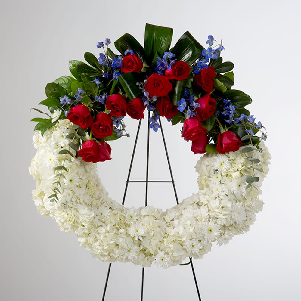 American Soul by BloomNation™ American Soul by BloomNation™ - A perfect way to honor their beliefs and actions, this red, white, and blue wreath is a tribute to those who loved their country.