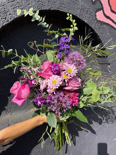 Hugs of Hues Bouquet - Send a gentle embrace with our Hugs of Hues Bouquet, a soothing blend of soft pastel pinks, purples, and lavender-toned blooms. Thoughtfully designed by our expert floral team at The Flower Cart, this bouquet is a tender expression of affection—perfect for lifting spirits, celebrating love, or simply brightening someone’s day.  Delicate blushes, lavender-toned, and pastel blooms create a dreamy, soothing palette, while deeper purple blooms and bright pinks add a touch of richness and depth. Accented with fresh greenery, this hand-arranged design brings comfort, elegance, and heart to any occasion. This bouquet is a perfect expression of affection, making it ideal for moments when you want to send a loving hug or brighten someone’s day with a burst of pastel beauty.  As a family-owned Baltimore Florist proudly serving our community since 1961, we specialize in handcrafted arrangements that speak volumes. We offer fast, same-day flower delivery in Baltimore, including Baltimore City, Baltimore County, and nearby areas.  Let The Flower Cart help you share love and light with beautiful, locally designed flowers—delivered with care and heart.