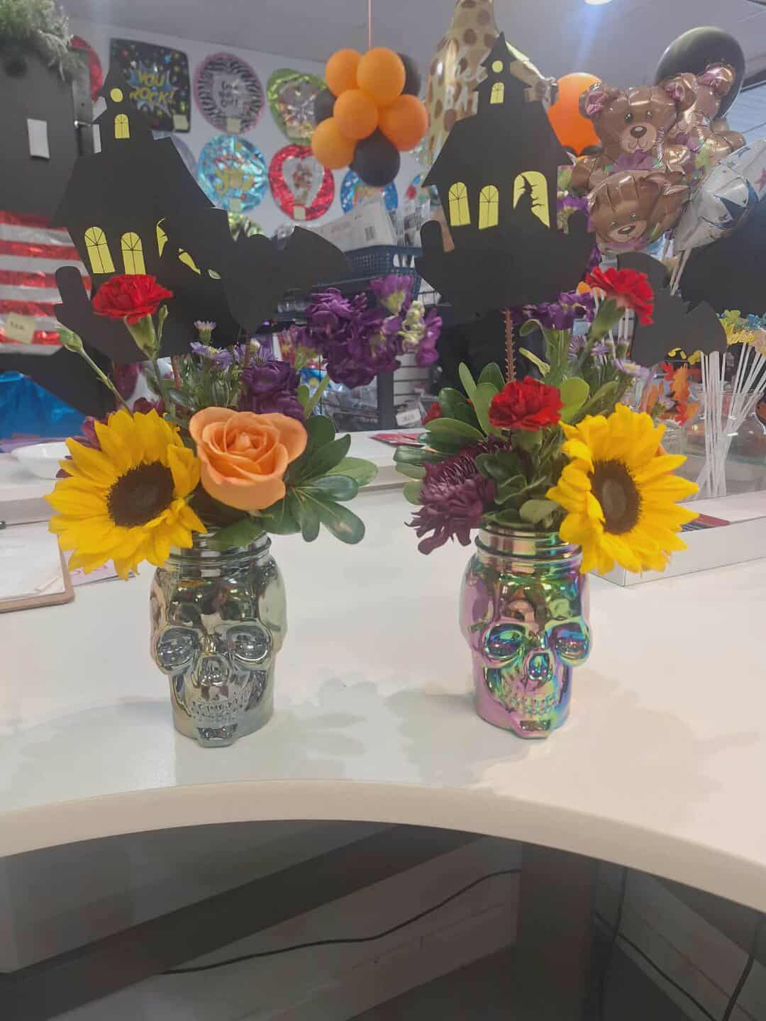 Skull Cup Arrangement Skull Cup Arrangement - Super cute floral arrangement to help spice up your Halloween decor