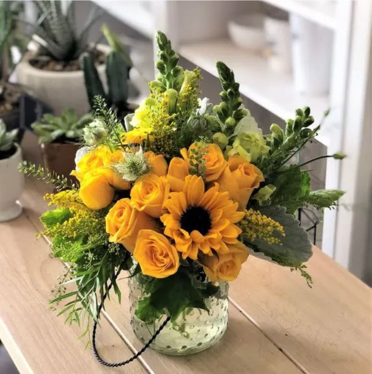 Hello Sunshine - Sunny Sunflower, With Roses, Snapdragons, Seeded Eucalyptus, Dusty Miller and Assorted Greens Make Up This Beautiful Bouquet That Will Definitely Brighten Up Someones Day!