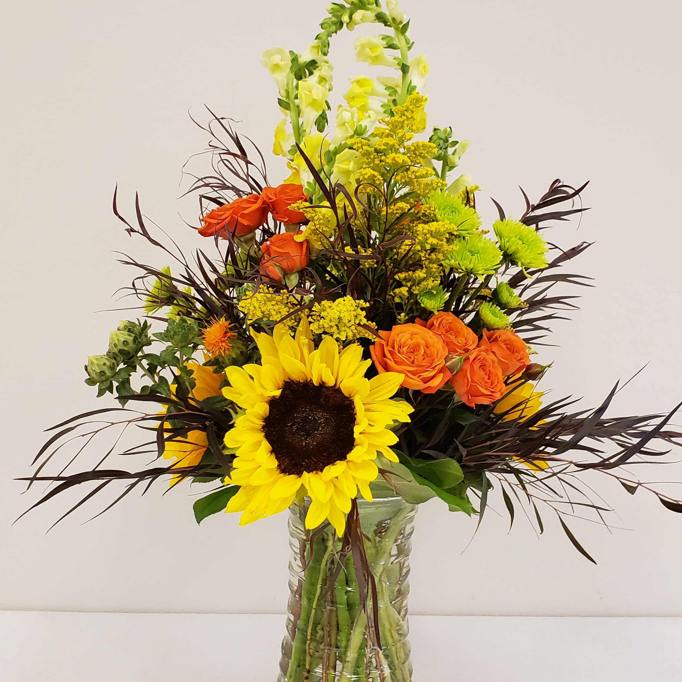 Fall Bounty - Fall Bounty  Celebrate the beauty of the season with Fall Bounty, a floral arrangement designed by your local florist in Olympia, WA,  Specialty Floral Design. Overflowing with the rich colors of autumn, this bouquet features vibrant seasonal flowers in warm tones that will instantly brighten any room. The lushness of Fall Bounty will grace any table, desk, or entryway, making it the perfect gift for fall birthdays, corporate appreciation, or simply to let someone know you’re thinking of them.  Gorgeous autumn colors burst from this stunning arrangement, bringing warmth, joy, and the spirit of the season. Whether you’re sending flowers to a friend, a client, or treating yourself, this bouquet is always the perfect choice.  We offer same-day flower delivery in Tumwater, WA, Lacey, WA, Olympia, WA, and surrounding areas. Each arrangement is handcrafted with care to ensure a one-of-a-kind design full of seasonal beauty.  Order today from Specialty Floral Design and let your thoughtful gift of flowers speak from the heart.     