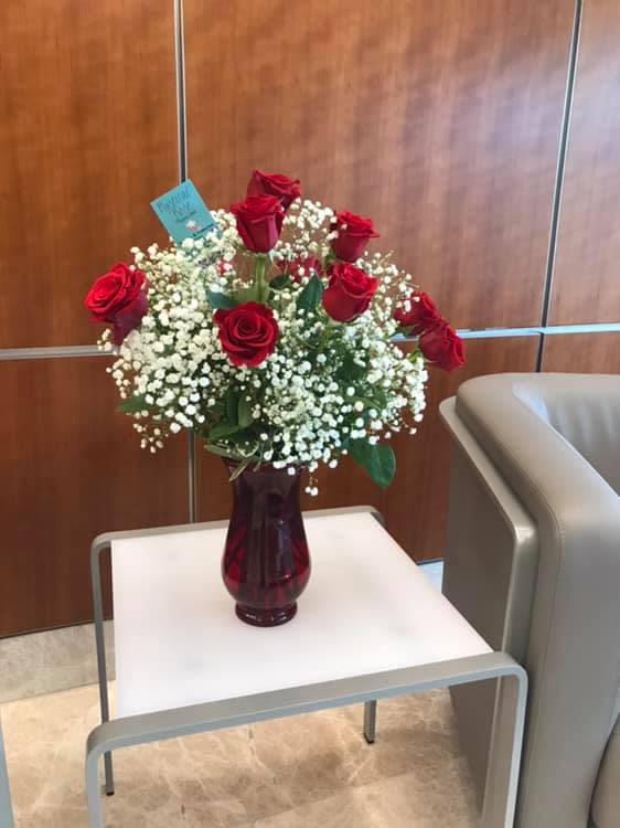 1 Dozen Roses with Love - For decades, 12 roses seems to be the key to the hearts of many.  Send the message that always sends love. This design is the typical florist's dozen.  Check out my other design work if you're looking for something more signature, modern, and less traditional.