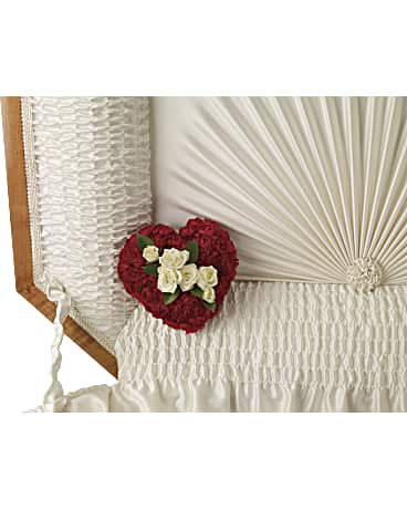 A Devoted Heart Casket Insert  - The picture of holiday romance. Wonderful white hydrangea and rich red roses fill our stunning silver mercury glass royal vase.