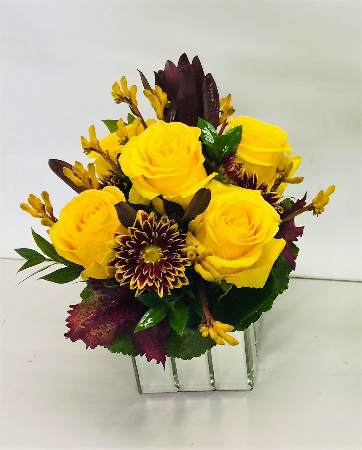 Yellow Splendor Mirrored Cube - A Beautiful Assortment of Yellow Roses,  and Mums Designed in This 4 Inch Cube Mirrored Container Will Brighten Up Your Day. Some Flowers May Vary Depending on Availability. 