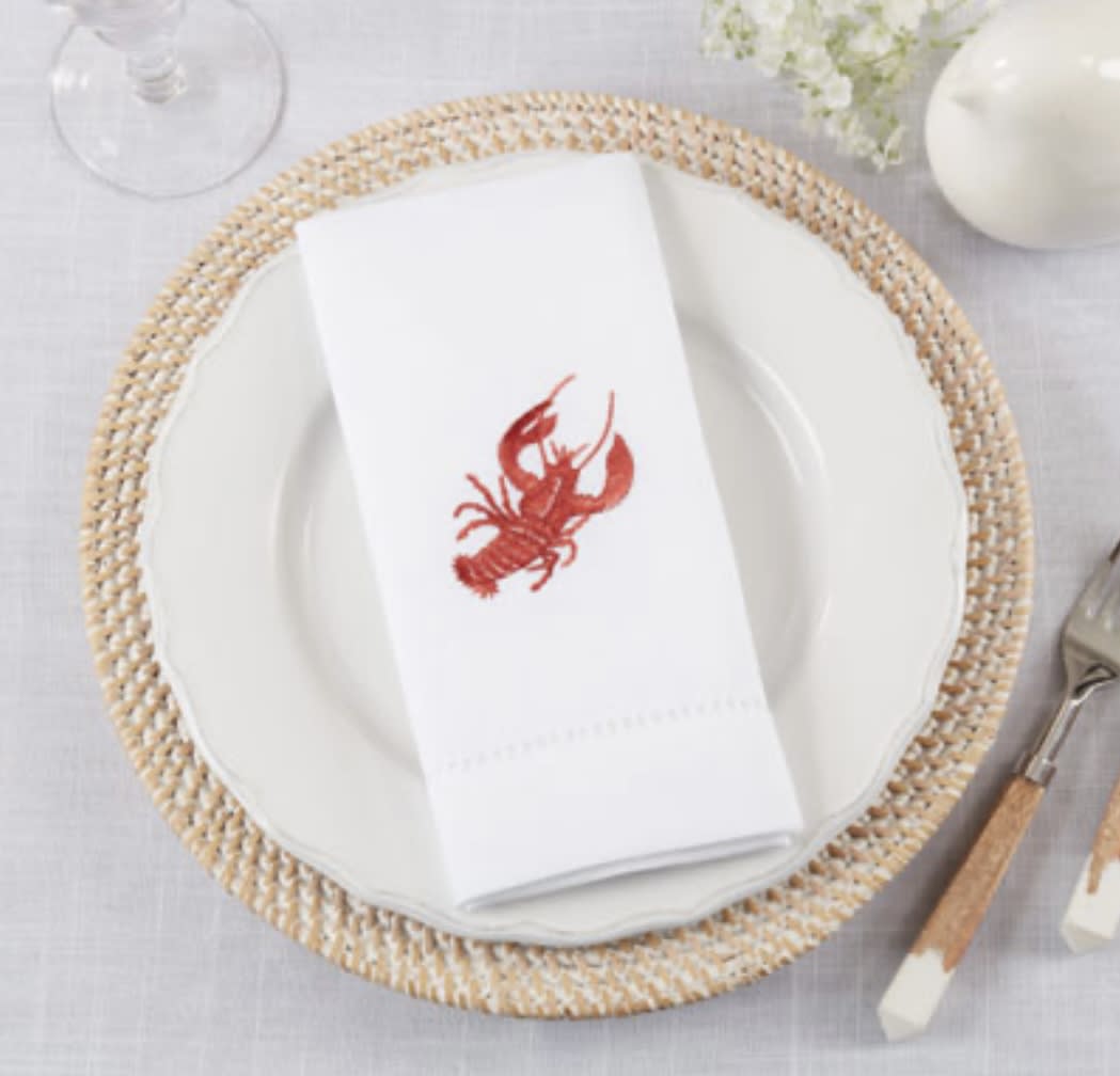 Set of 4 Embroidered Red Lobster Napkins - Perfect for cocktail parties and hosting dinners, these charming lobster napkins bring style and a touch of whimsy to your table. Tax free, same day hand delivery.   Discover the art of giving at Petals, Wilmington, Delaware’s destination for luxury gifts and home décor. Our curated collection features beautifully crafted items for every occasion — birthdays, weddings, anniversaries, holidays, and life’s special celebrations. At Petals, we believe every gift should tell a story. From hand-poured candles and elegant keepsakes to stylish home accents, gourmet treats, and floral-inspired décor, our selection combines timeless charm with modern sophistication. Each piece is chosen with care to reflect the quality, creativity, and personal touch our Wilmington customers love.  Same-day delivery available throughout Wilmington and nearby areas including Greenville, Hockessin, Newark, and the Brandywine Valley Whether you’re looking for a thoughtful hostess gift, a luxury home accent, or something simply beautiful to brighten someone’s day, Petals offers fine gifts and personalized service that make every occasion memorable.  Visit our Wilmington boutique or shop online today — and see why Petals is Delaware’s trusted name for fine gifts and inspired giving.