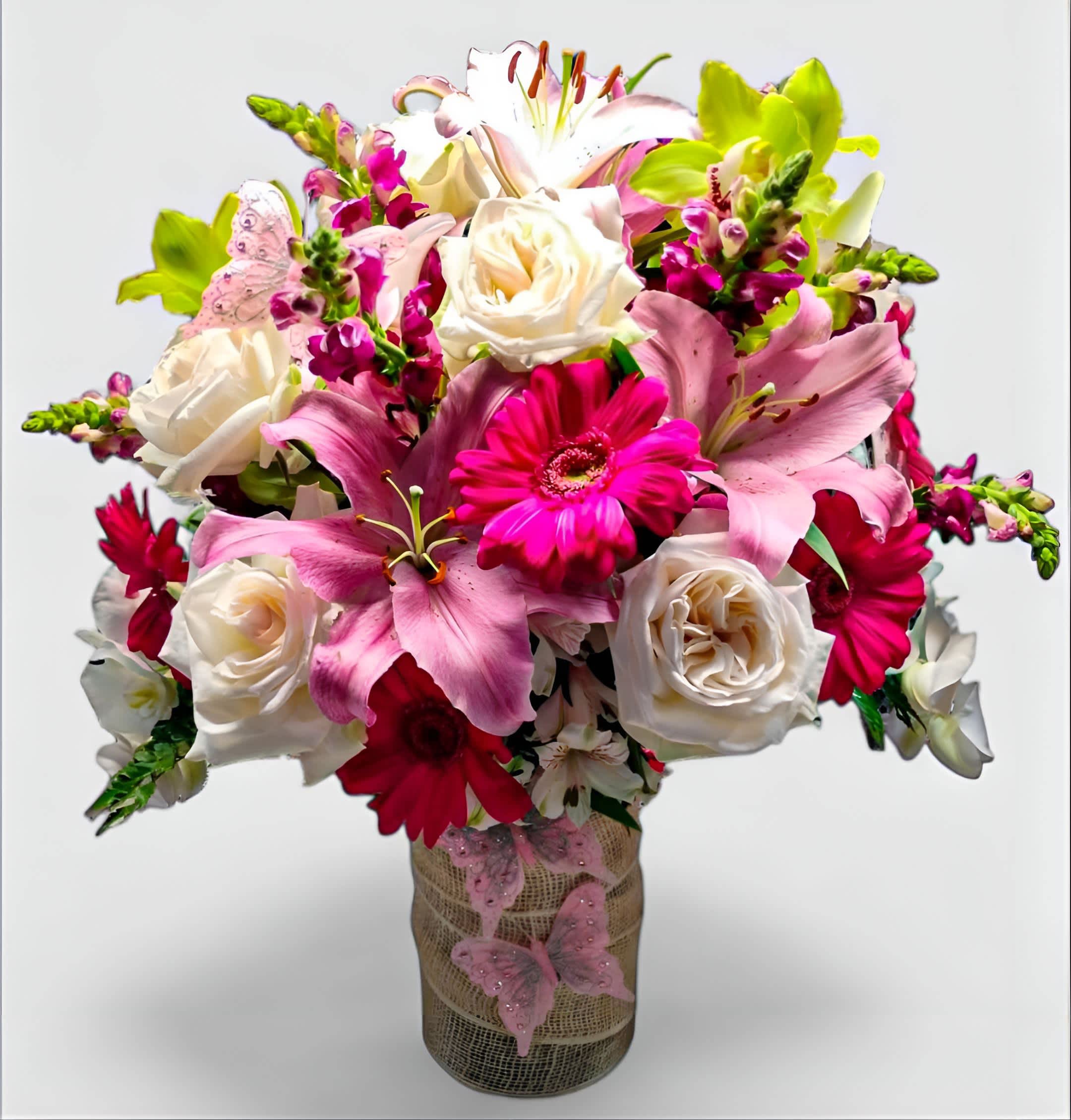 Pink Sympathy Designer's Choice - Designer's choice; made beautifully from my pink and vanilla blossoms of the day roses orchids hydrangeas and so much more arranged in a tall modern glass cylinder vase wrapped in pretty pink jute ribbon. Beautiful and perfect to send today to show them how much you care. All of my bouquets are always made unique and extra special each and every time. Send them your deepest condolences.
