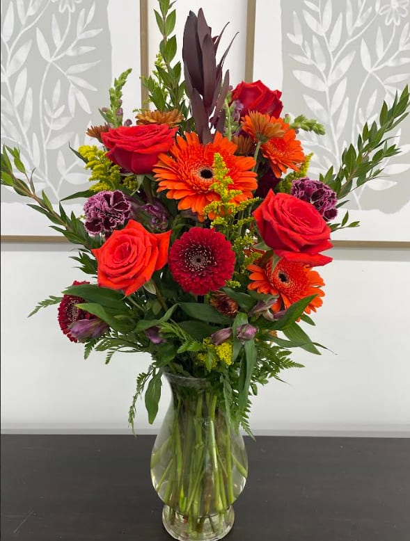 Tangerine  - A vase full or bright orange flowers.  Sure to bring a smile!    (pictured is showing Premium size) 